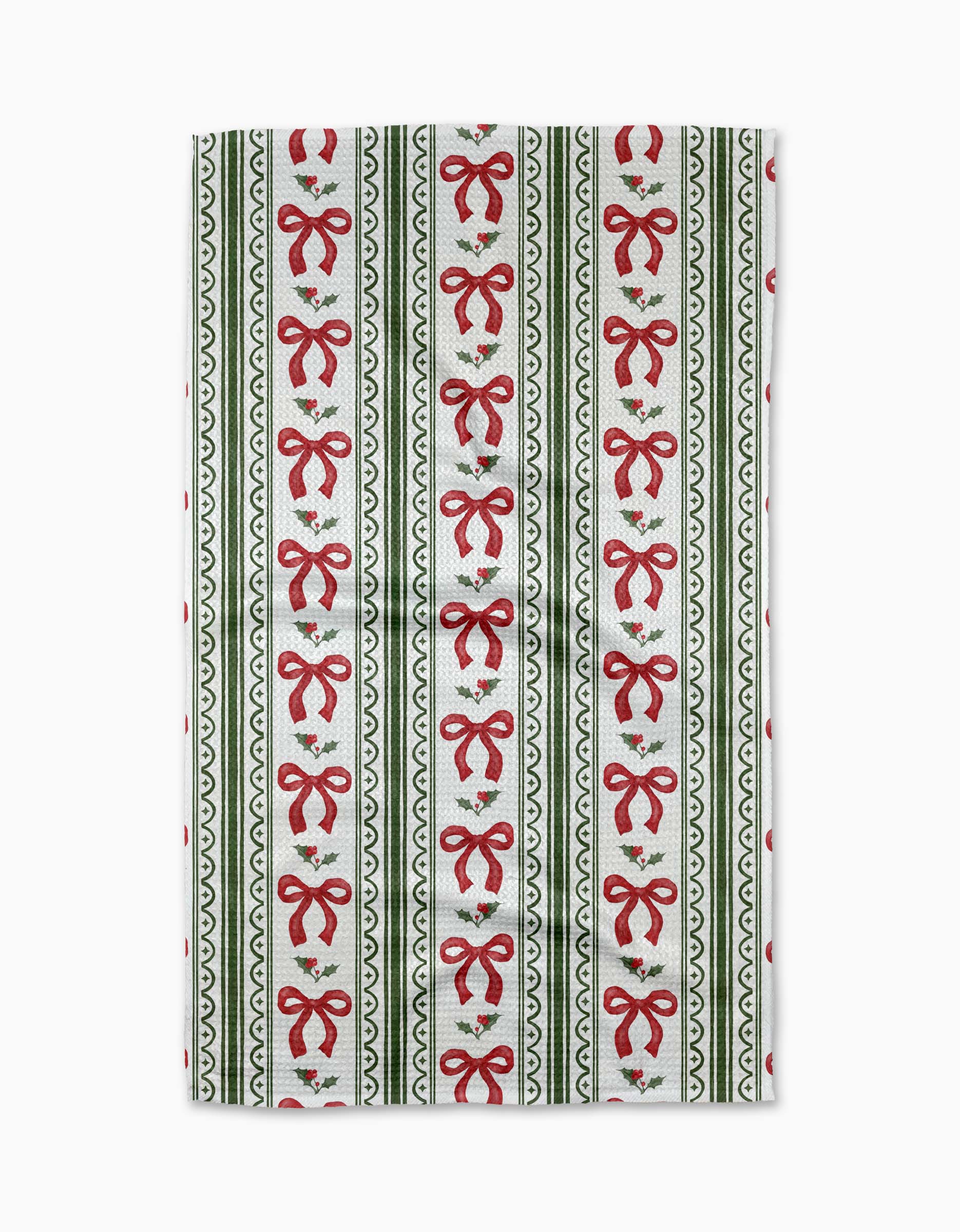 The Aubrey Fairchild Christmas Bow Stripe tea towel features vertical stripes with red bows and green holly on a white background, separated by green zigzag and dotted lines. Made from recycled materials, it's an eco-friendly, absorbent kitchen towel.