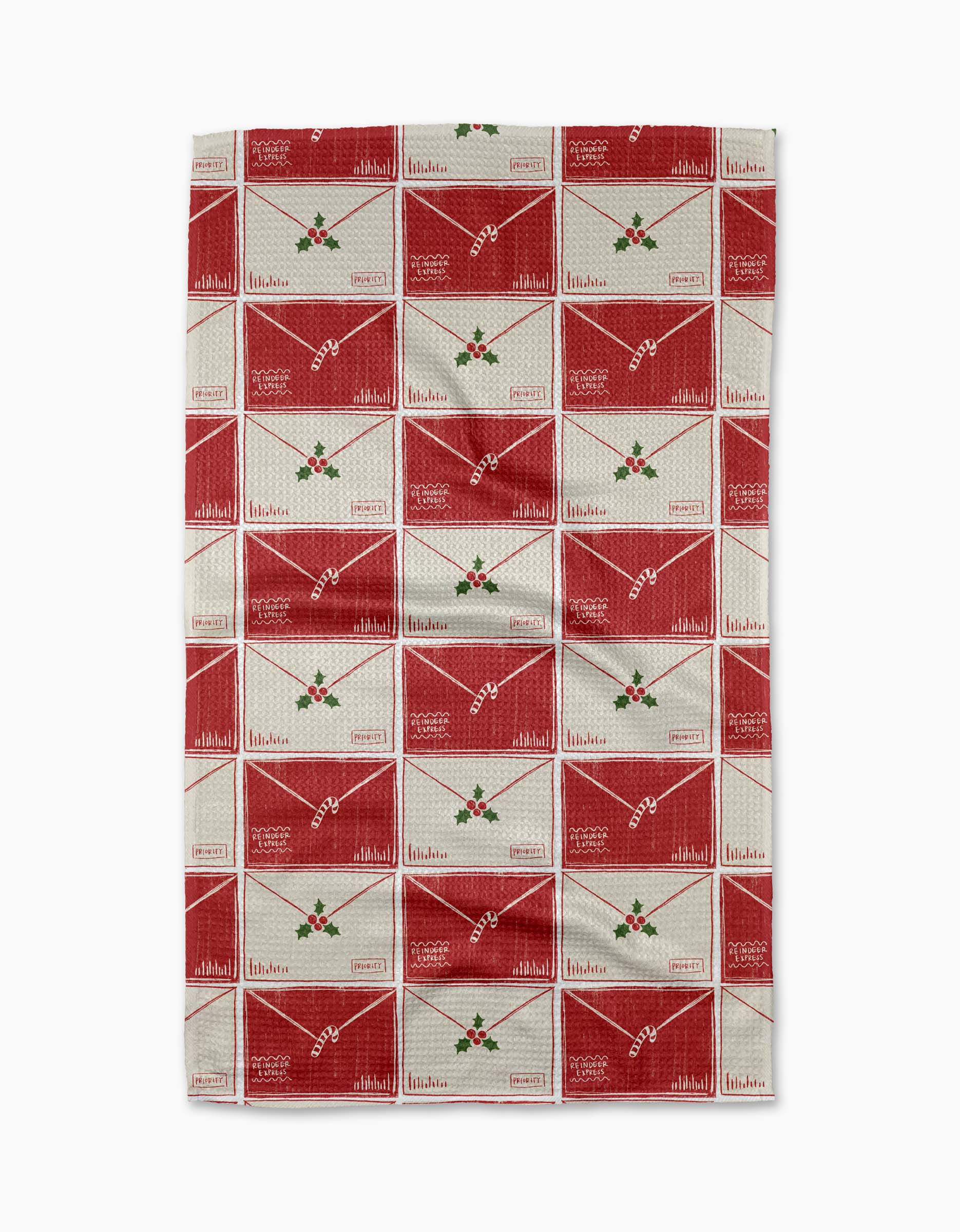 The Aubrey Fairchild Christmas Letter Stack tea towel features a festive red and white envelope pattern with holly accents, each marked North Pole. Ultra-absorbent and eco-friendly, it’s crafted from recycled materials for holiday cheer.