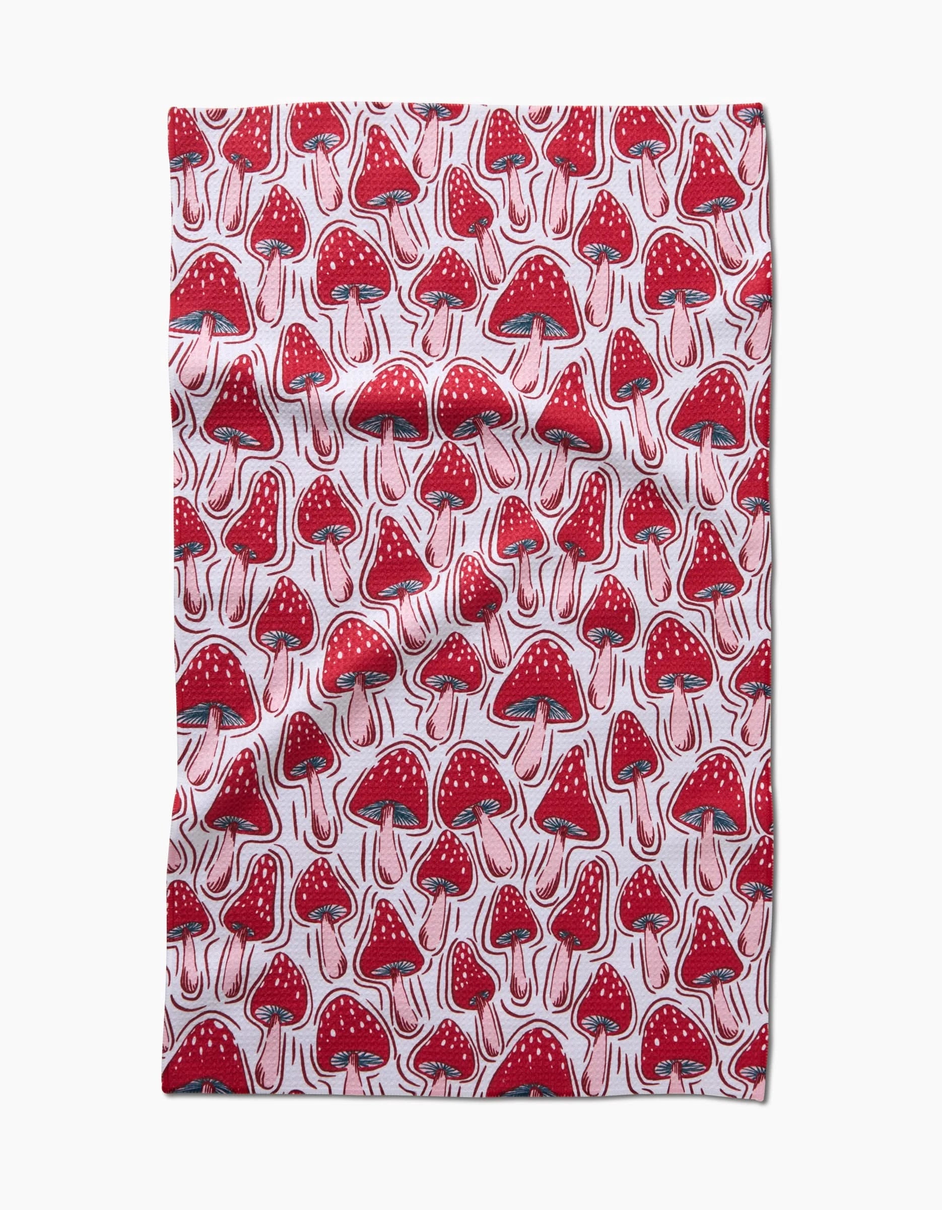 The Christmas Mushrooms Tea Towel by Hufton Studio is made from Geoweave fabric and features a pattern of red and white-spotted mushrooms in various sizes and orientations on a white background.