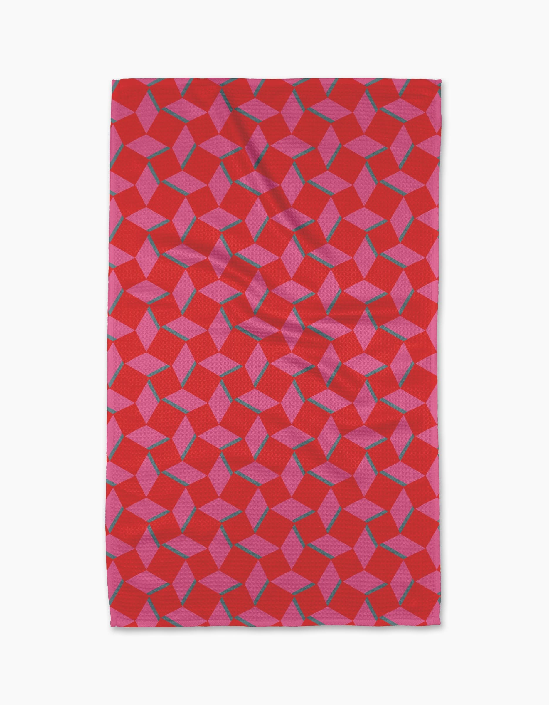 The Geometry Circus Stand Tea Towel features a red rectangular design with pink and blue interlocking cubes for a 3D optical illusion, crafted to eco-friendly standards for both style and sustainability.