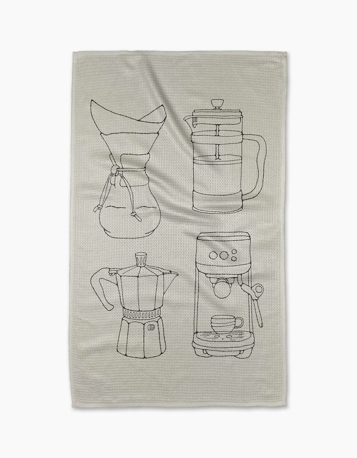 Coffee House by Rosa Kichline is a quick-drying beige tea towel with black line drawings of a Chemex, French press, moka pot, and espresso machine with a cup underneath.
