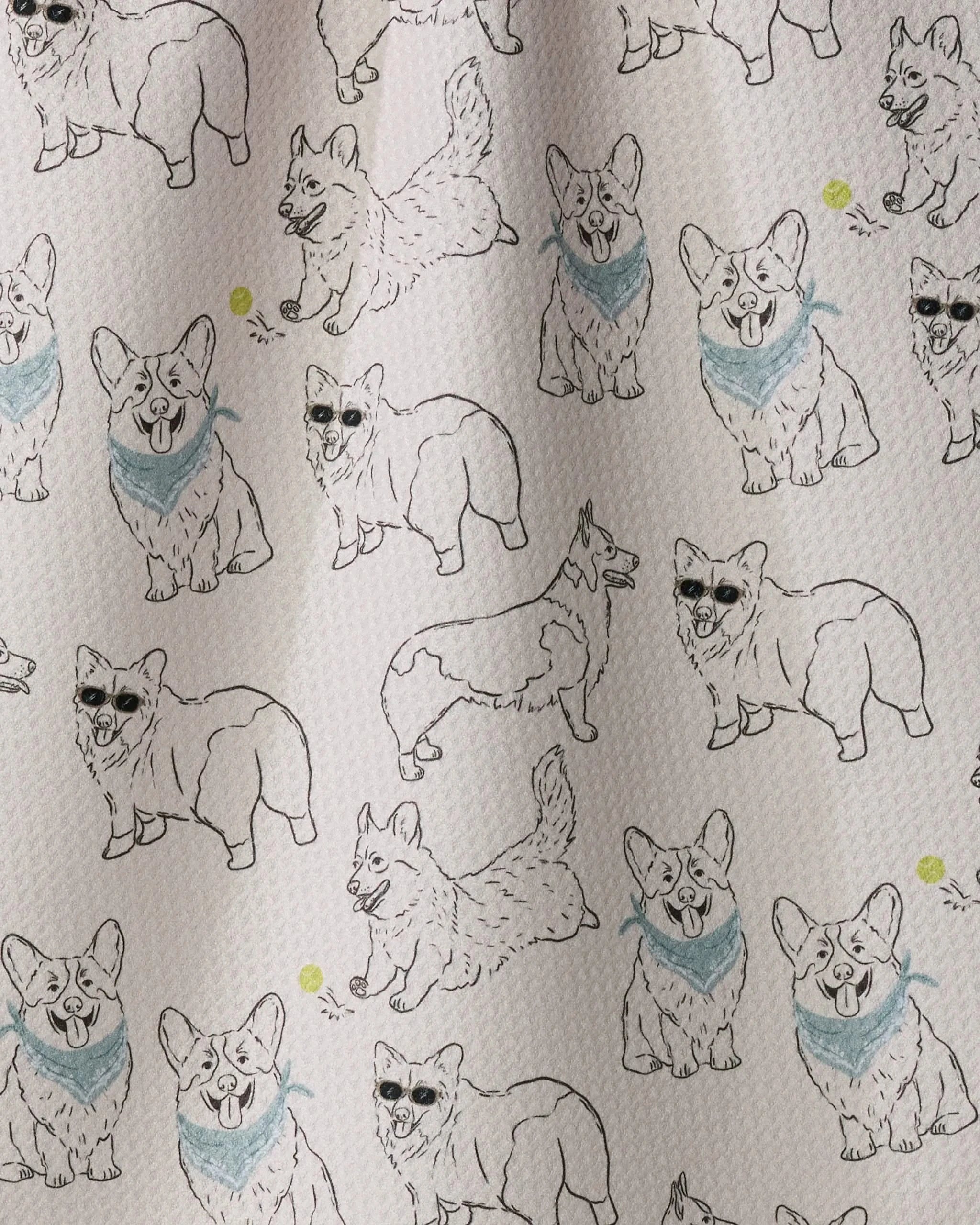 Introducing Corgi Club by Geometry: an ultra-absorbent towel featuring hand-drawn corgi dogs in a variety of playful poses, some wearing blue bandanas or sunglasses, with cheerful yellow dots sprinkled throughout the design. Perfect as a tea towel or recycled kitchen towel, Corgi Club combines eco-friendly practicality with whimsical style.