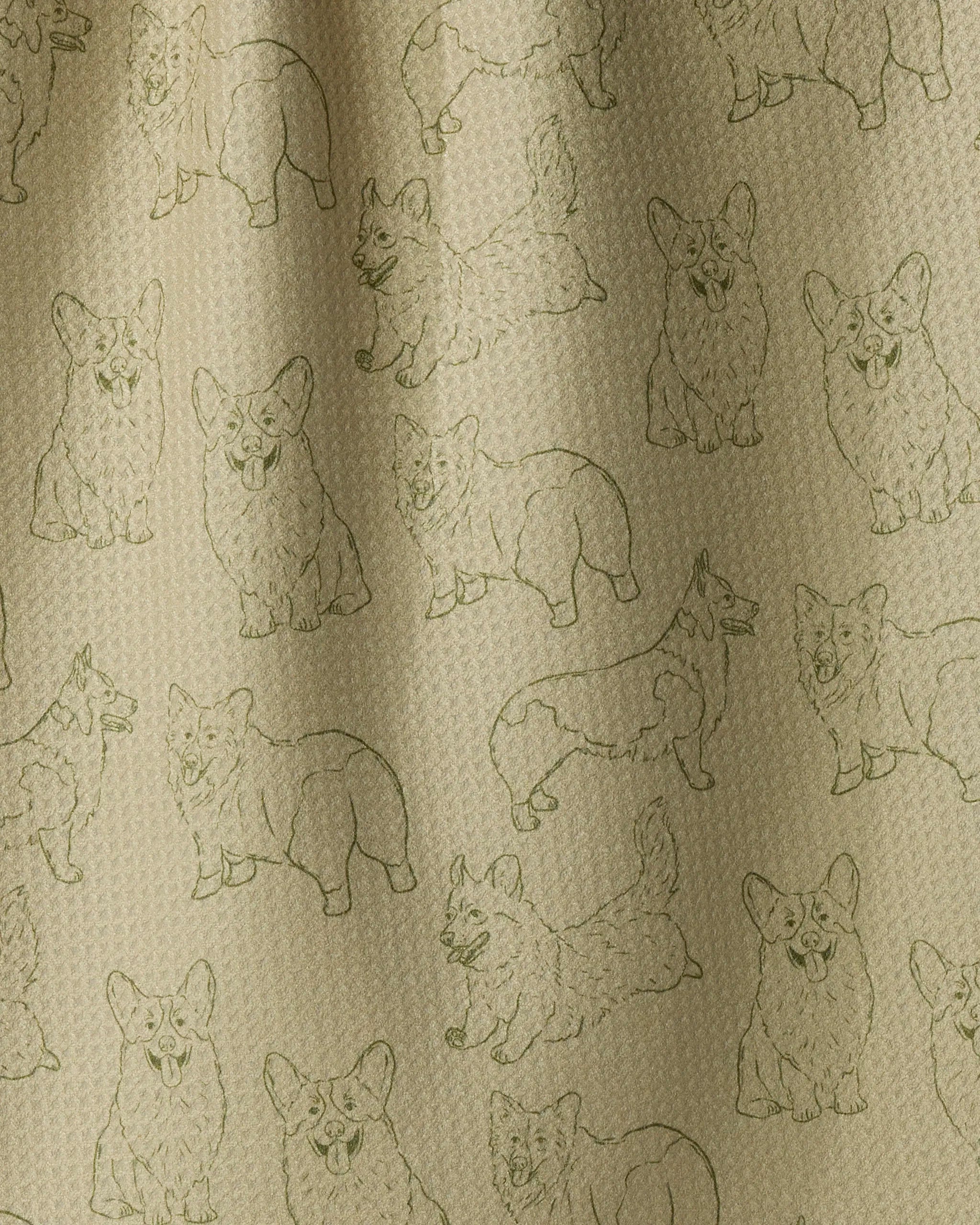 Crafted by Geometry, the “Corgi Pups” tea towel features beige fabric adorned with a repeating line-drawn pattern of Corgi dogs in various poses—sitting, standing, and lying down. This delightful accessory brings playful charm and practical function to any kitchen.