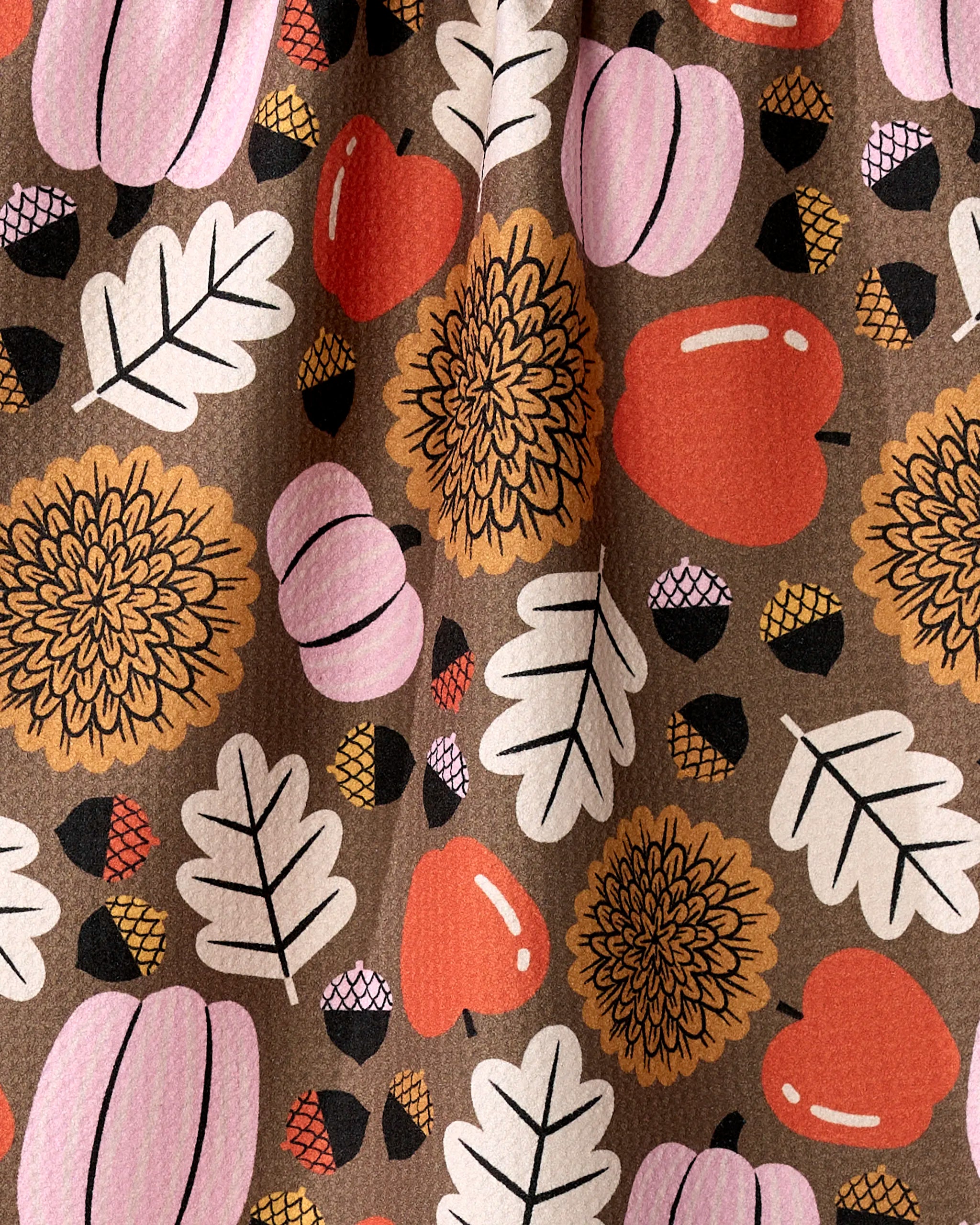 Crisp and Cozy by Megan Roy is a quick-drying fabric with white leaves, orange/yellow flowers, pink/orange pumpkins, and small acorns on brown—ideal for a festive fall tea towel.