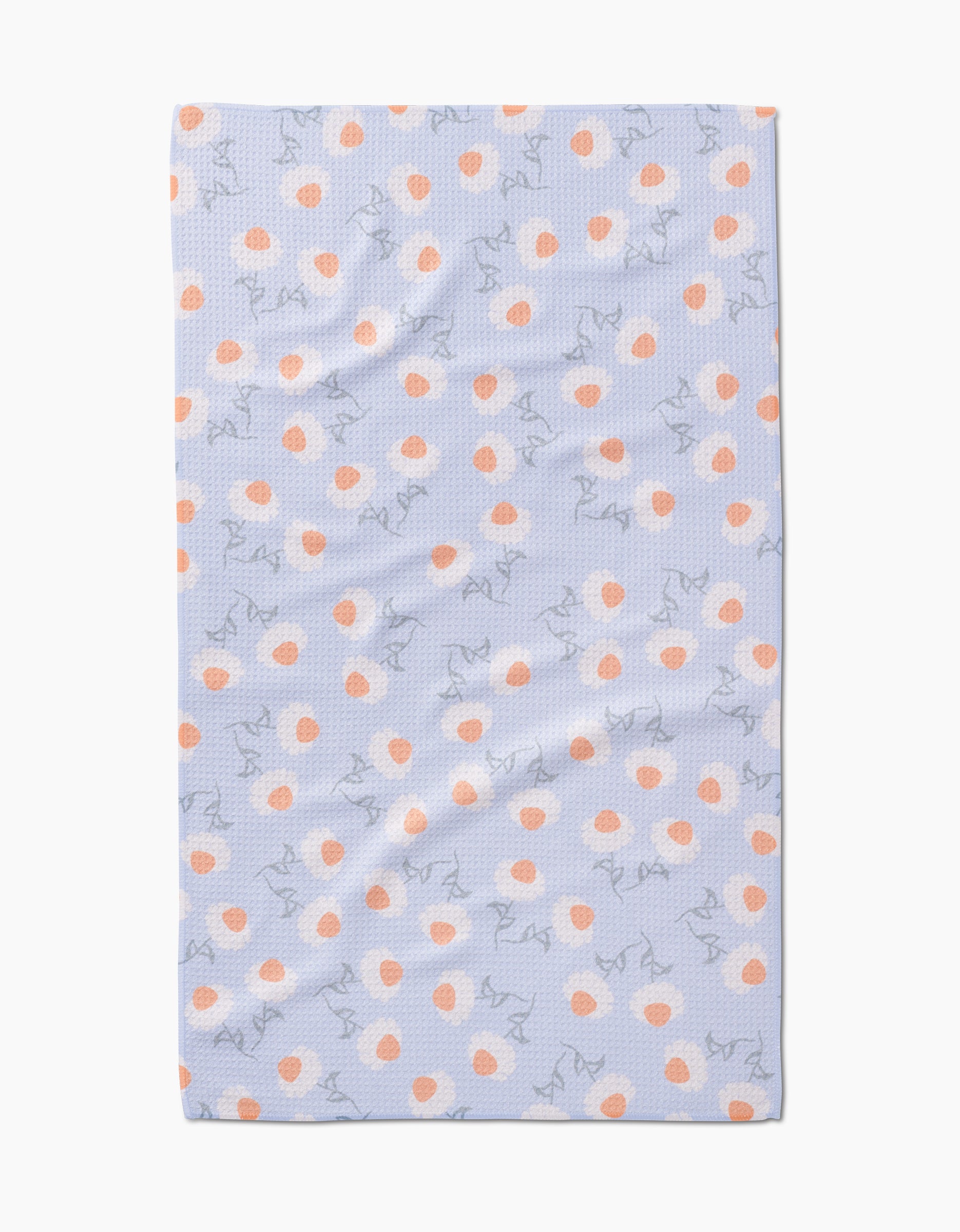 The Daisy Duets tea towel by Sarah Reed is rectangular, light blue, and made from soft Geoweave fabric with orange dots and outlined cats in various poses—a textured, charming addition to any kitchen.