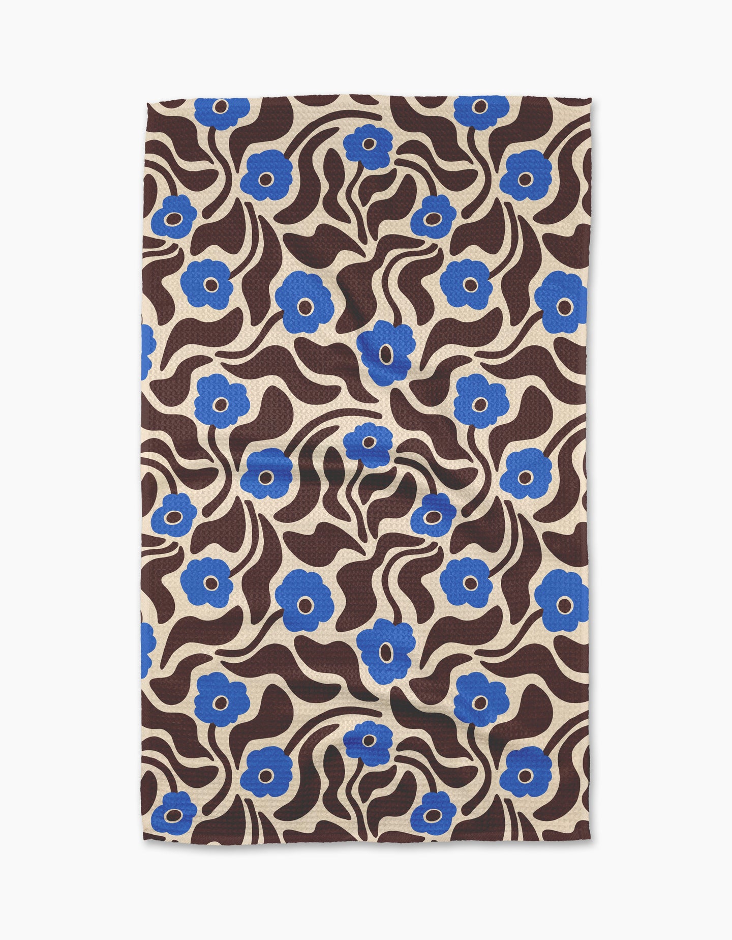 The Gerdadzy Dancing Blooms tea towel features a beige background with blue flowers, wavy brown lines, and leaves in a bold, retro style. Made from recycled materials.