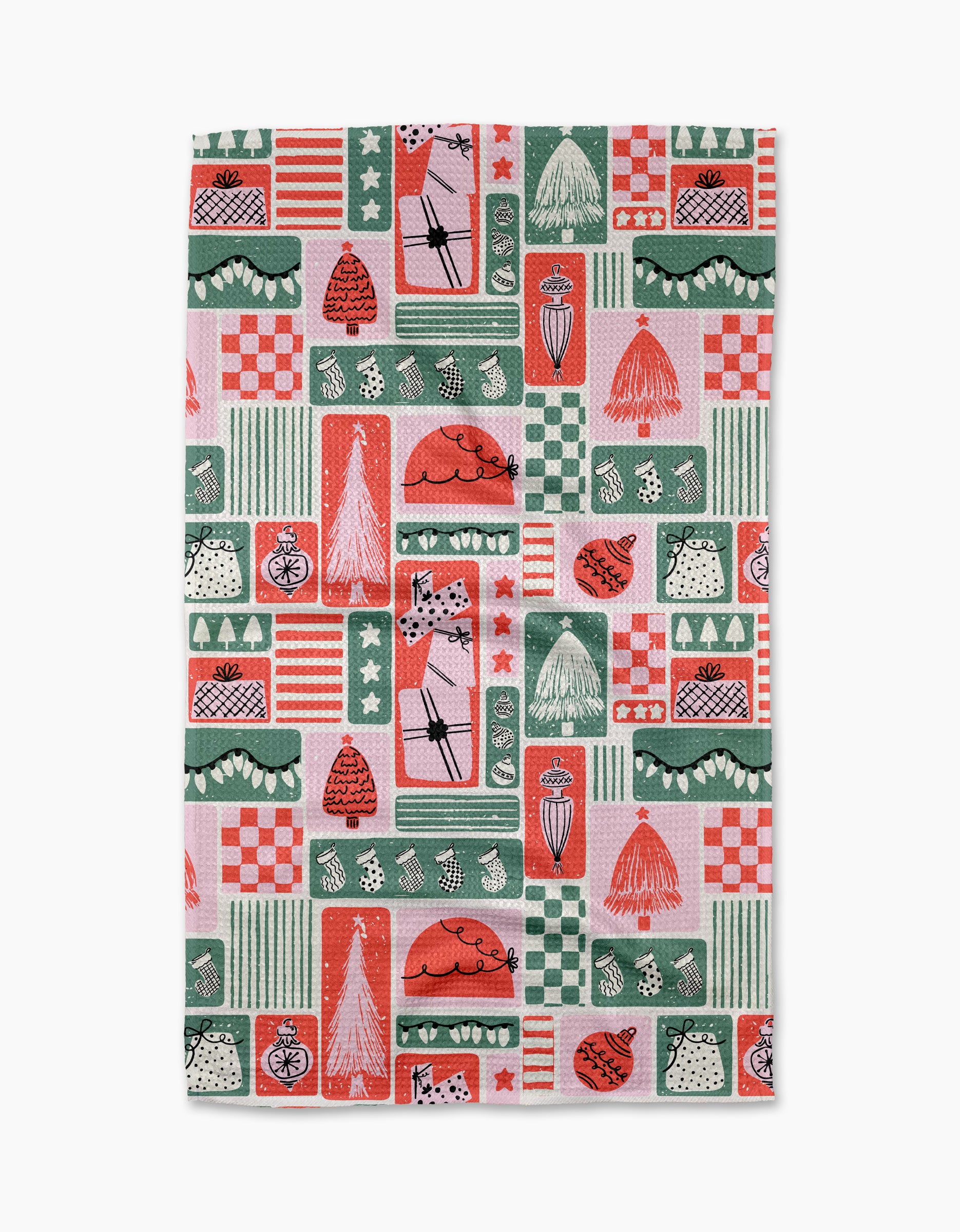 The Days of Christmas kitchen towel by Charlie Rowan Designs features a geometric, whimsical pattern in red, green, and white with assorted shapes and stars in a grid—crafted from recycled materials for an eco-friendly touch.