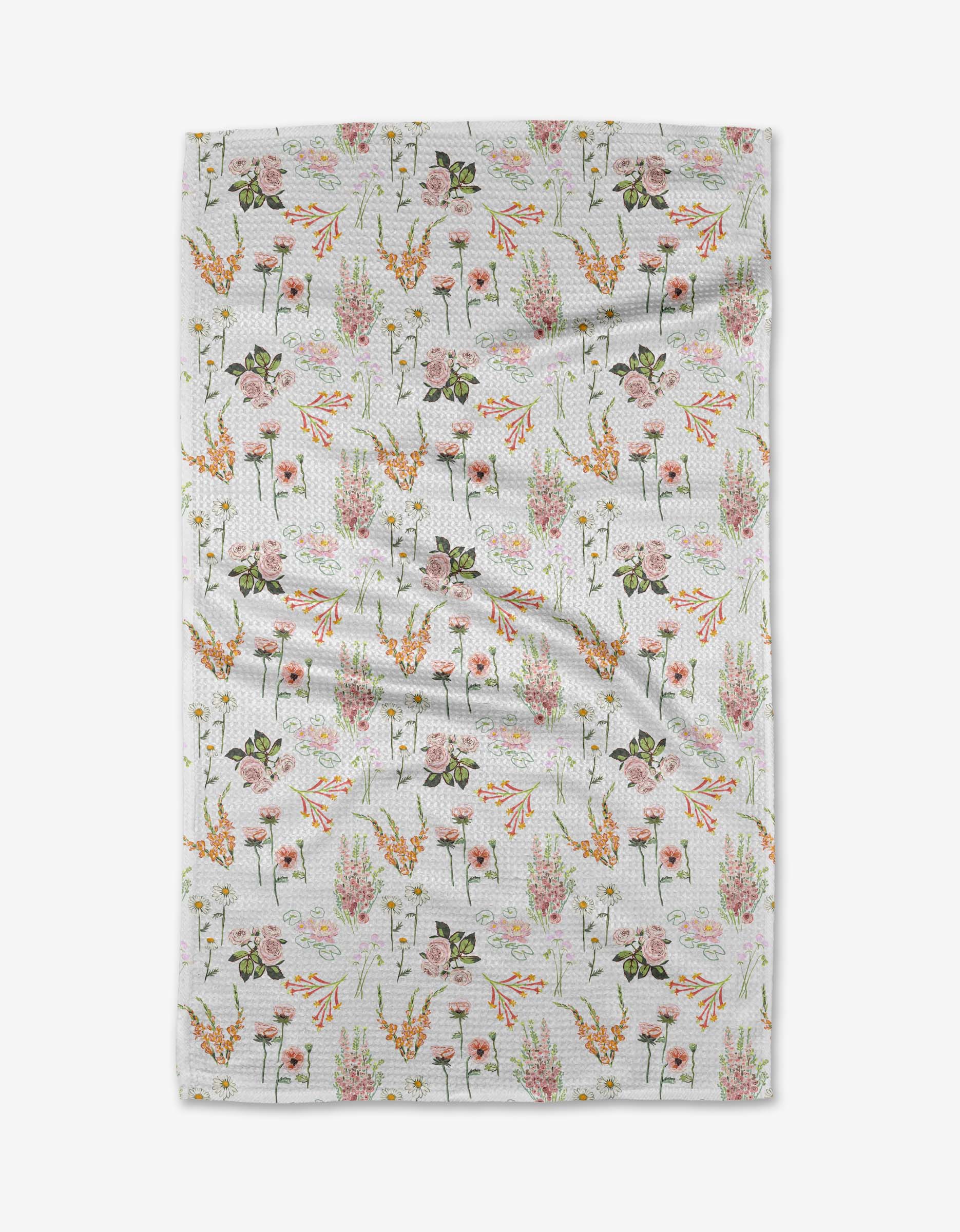 The Elisabeth Wing Delicate Floral blanket features a white textured Geoweave™ fabric with a repeating pattern of colorful flowers and green stems, shown slightly wrinkled on a plain white background.