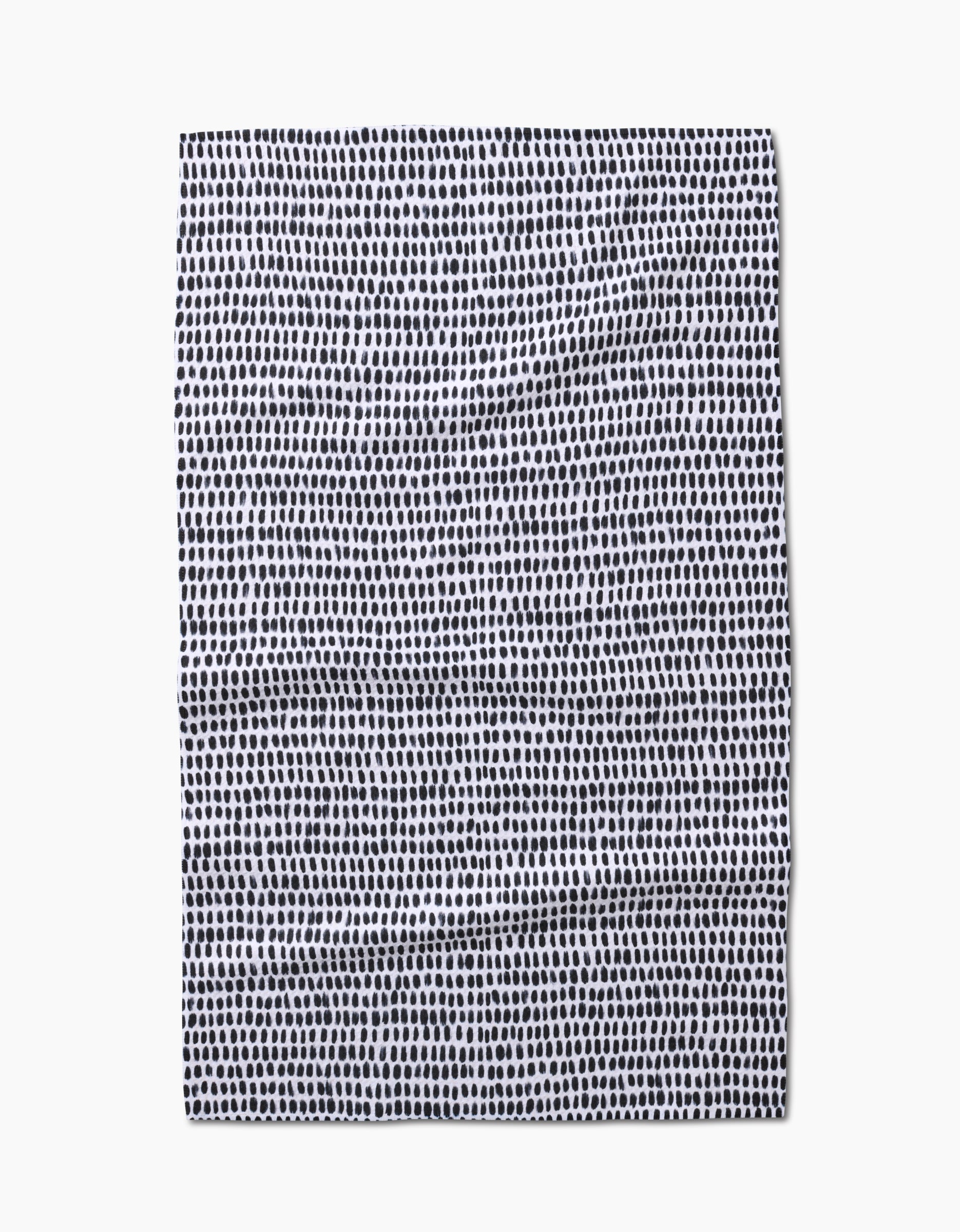 Geometrys Dot Dot Dot Fresh Linen is a square recycled kitchen towel featuring an irregular grid of small, uneven black dots on a white background. The slightly wrinkled fabric is shown laid flat on a white surface.
