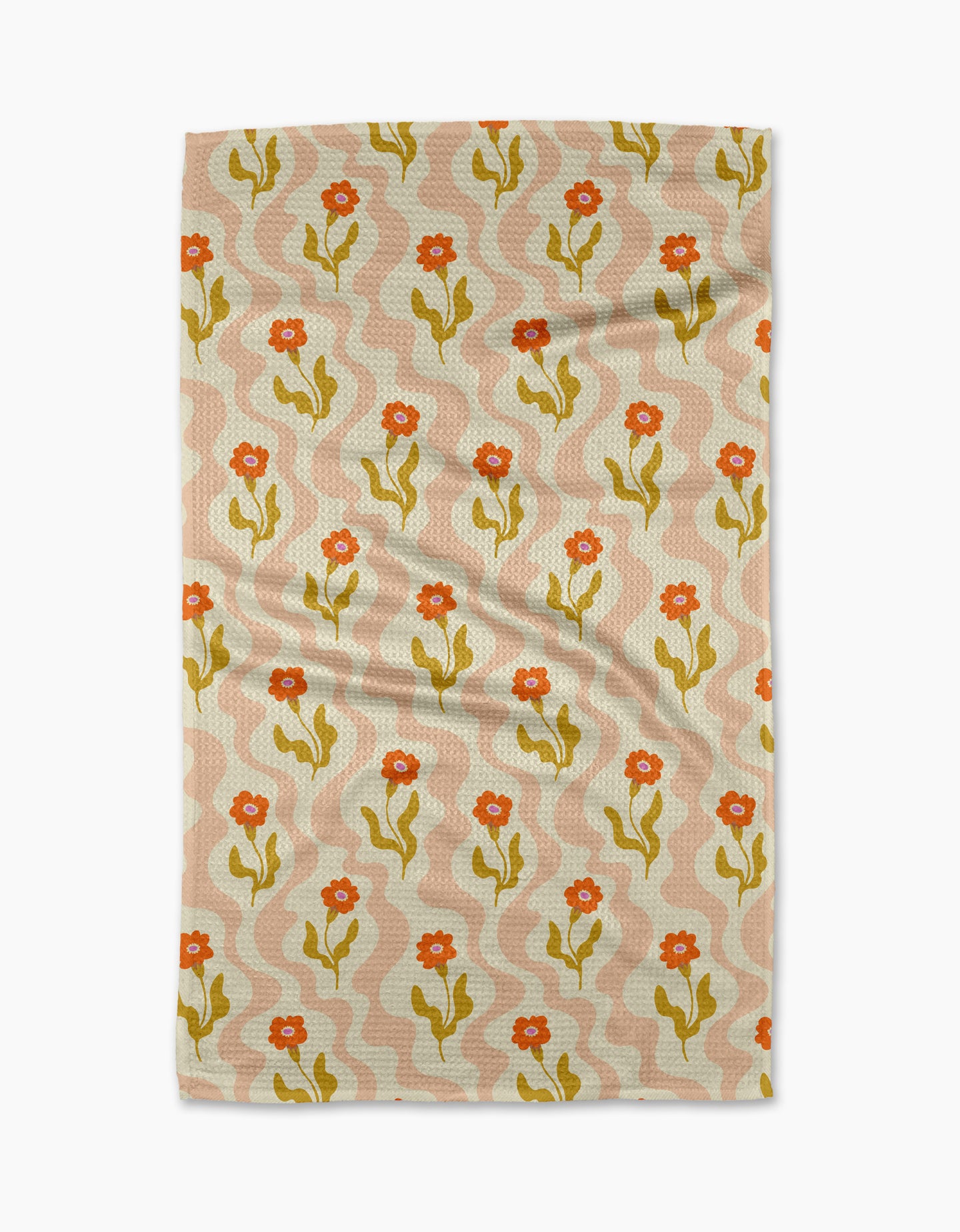The Gerdadzy Dreamy Path dish towel features a rectangular, absorbent design with orange flowers, green stems, and light pink wavy lines on a beige background. The fabric has a slightly wrinkled appearance.