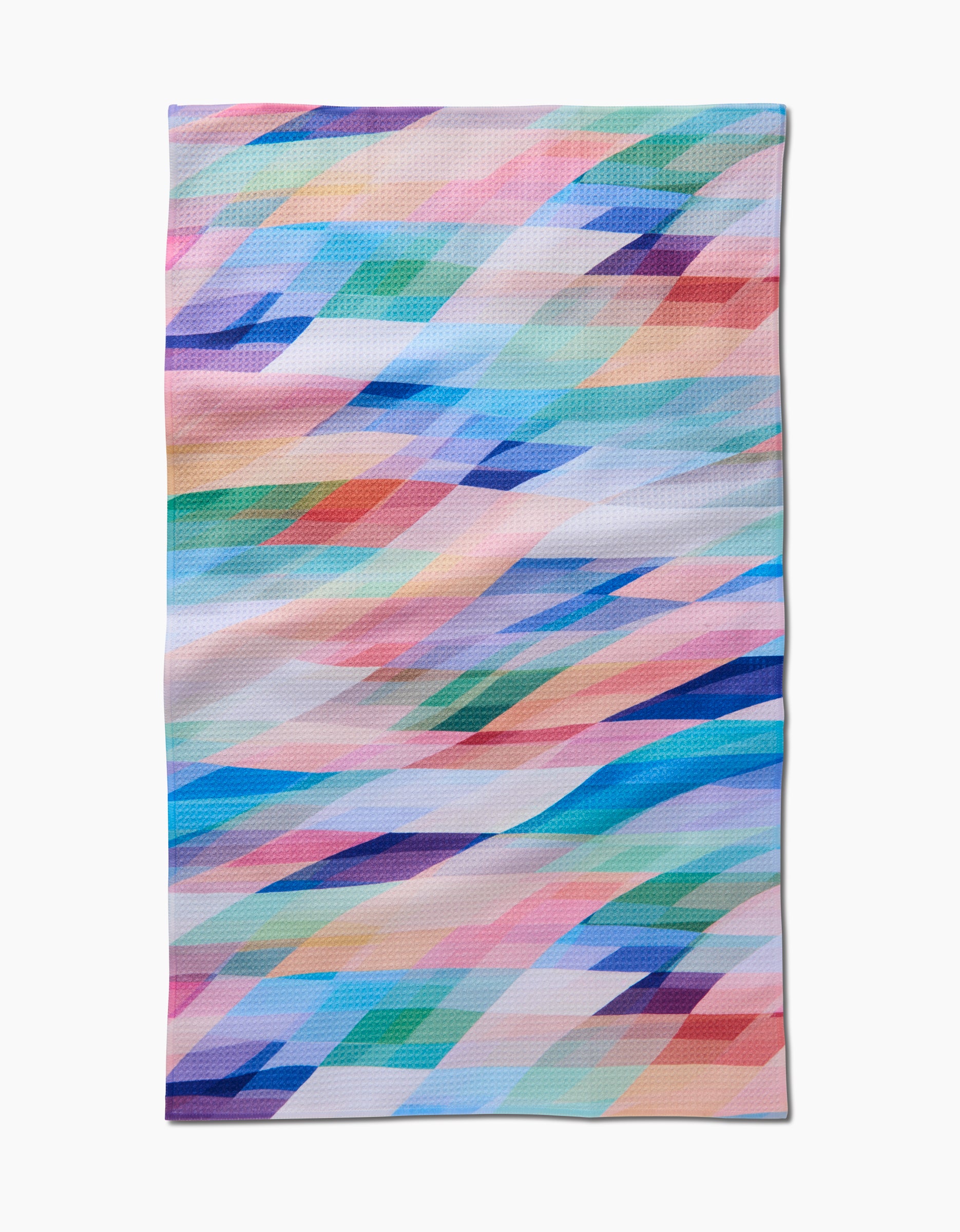 The Eventide Tea Towel by Rachel Parker features a colorful, geometric pattern of overlapping shapes in blue, pink, green, purple, and orange on white. Made from Geoweave™ fabric with slightly uneven edges.