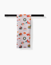 The Fall Favorites tea towel by Ceyda Alasar features vibrant Thanksgiving motifs—pumpkins, pies, turkeys, wreaths, and autumn leaves—on white. Quick-drying, it brings festive charm to your kitchen décor.
