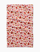 The Fall Leaves tea towel by Kayla Ann features a red, orange, and brown autumn leaf pattern on white. This absorbent, slightly wrinkled cloth is perfect for adding eco-friendly charm to your kitchen décor.