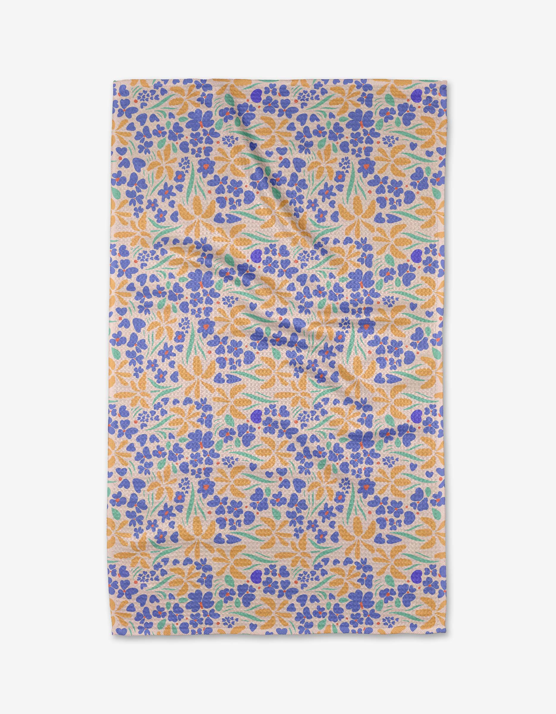 The Elisabeth Wing February tea towel features a colorful floral design with orange, blue, and green flowers on white Geoweave™ fabric. Shown slightly wrinkled against a white background.