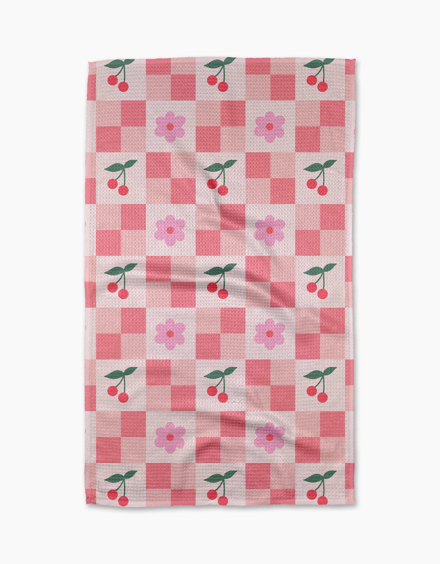 The Floral and Cherries tea towel by Letters By Shells features a pink and red checkered design with cherries and pink flowers, crafted from recycled materials for an eco-friendly touch.