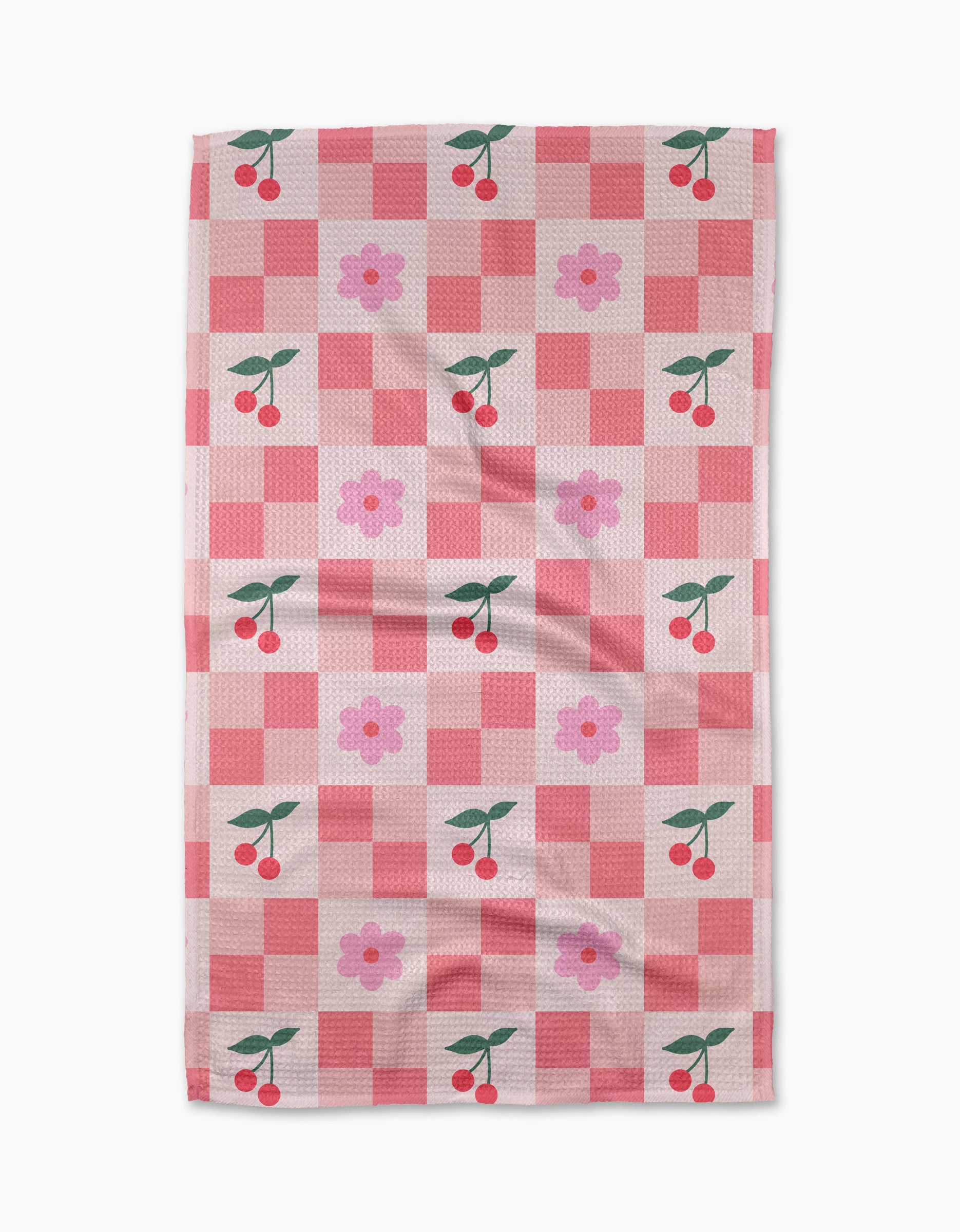 The Floral and Cherries tea towel by Letters By Shells features a pink and red checkered design with cherries and pink flowers, crafted from recycled materials for an eco-friendly touch.