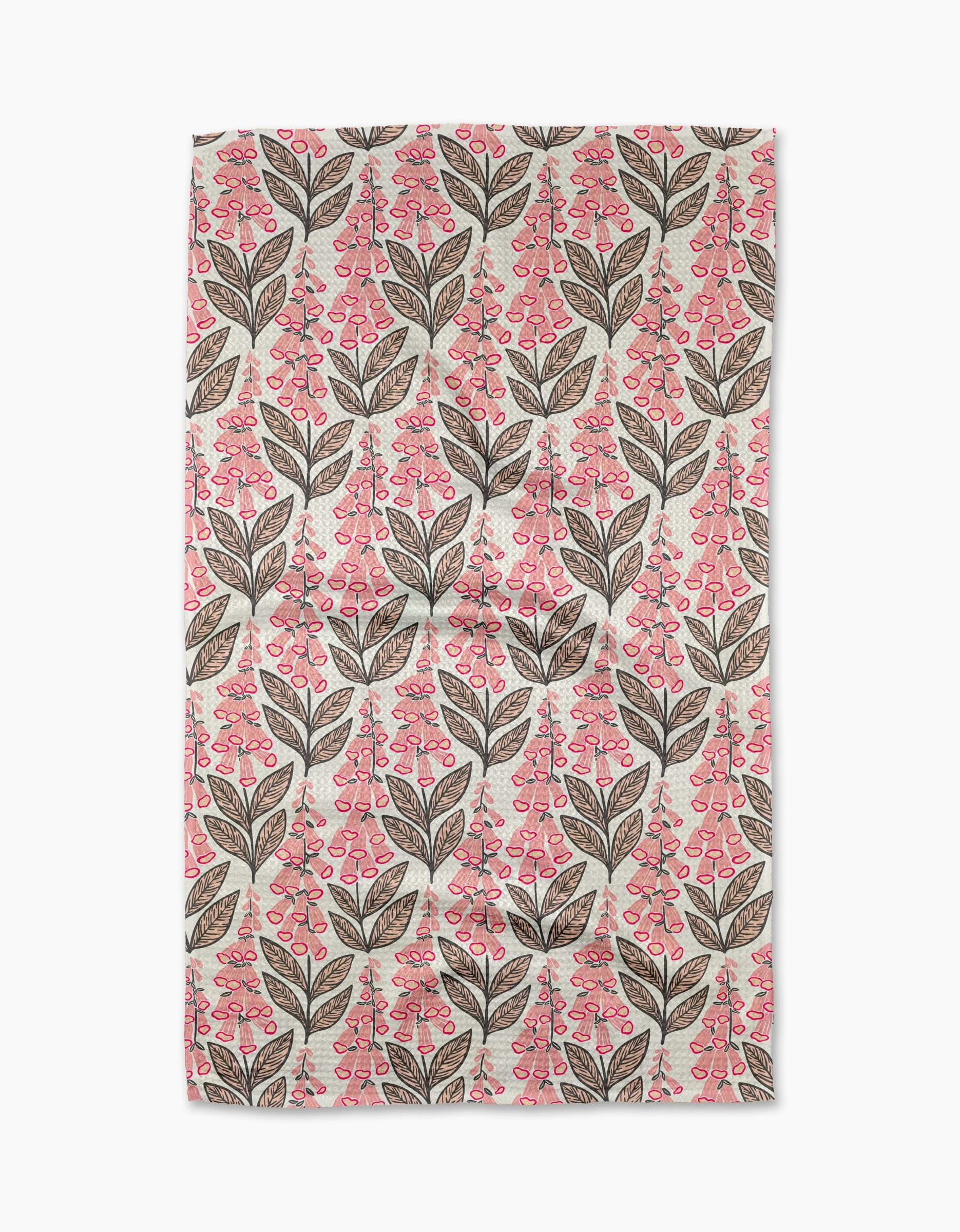 The Foxglove Finery tea towel by Sarah Daugherty features a symmetrical, evenly spaced pattern of brown leaves and pink berry clusters on light beige, crafted from quick-drying recycled materials.
