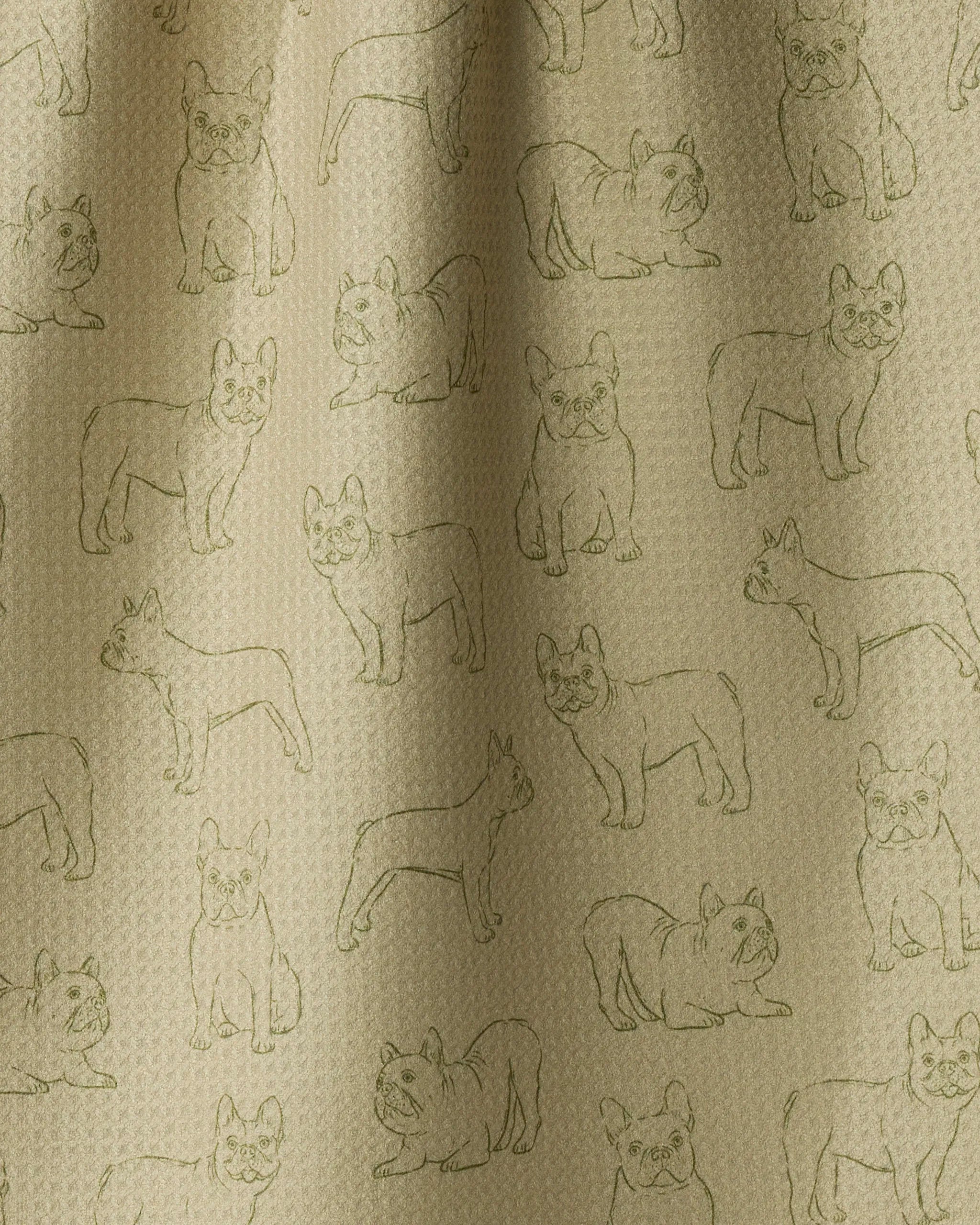 The Geometry “Frenchie Pups” dish towel features a beige, absorbent fabric with a textured surface and an all-over pattern of outlined French bulldogs in various poses. Charming and practical, it’s perfect for adding personality to your kitchen.