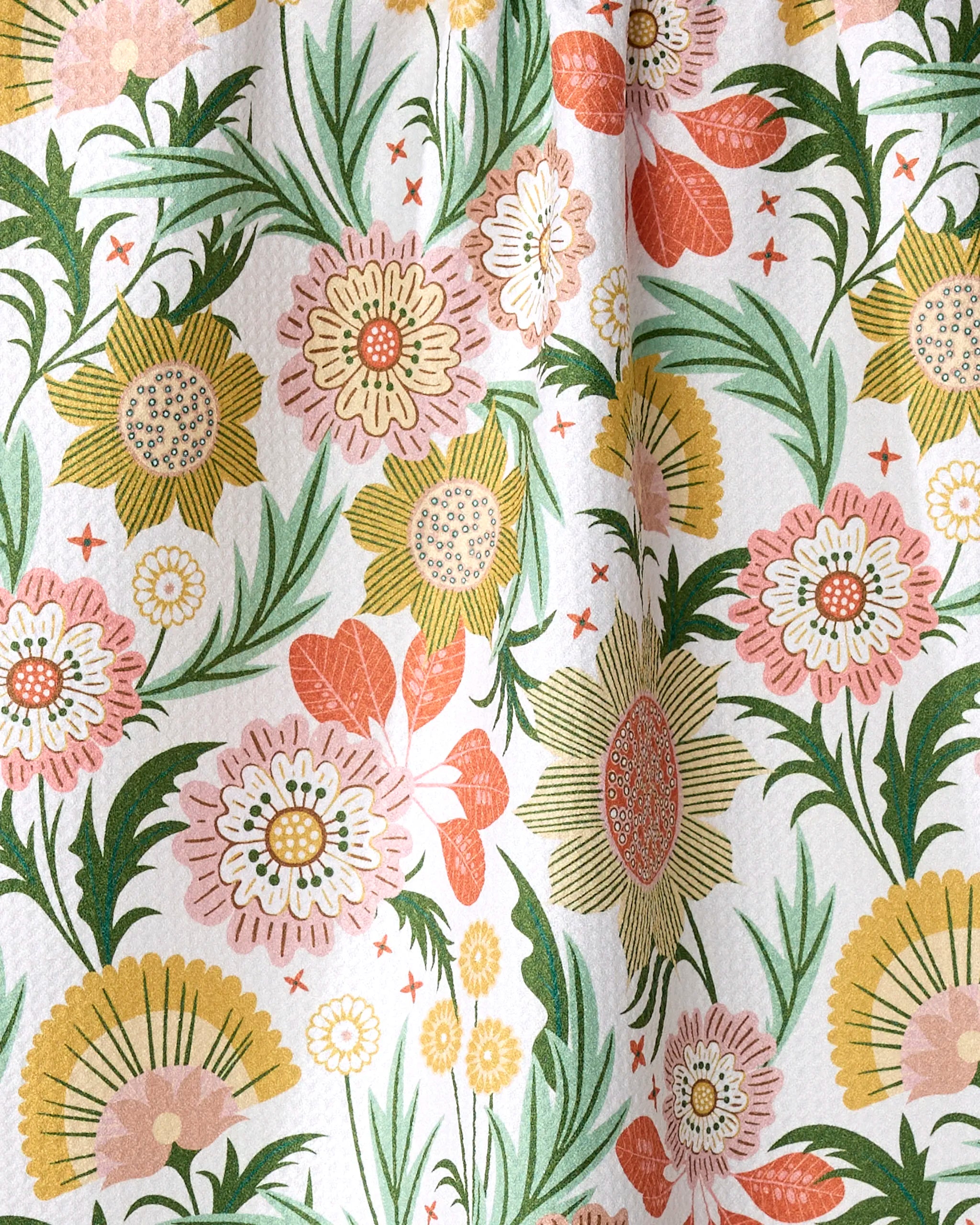 Garden Dreams by Rachel Parker is a whimsical, hand-drawn floral fabric with yellow, pink, and orange flowers plus green leaves on white—ideal for an eco-friendly kitchen towel or charming absorbent dish towel.