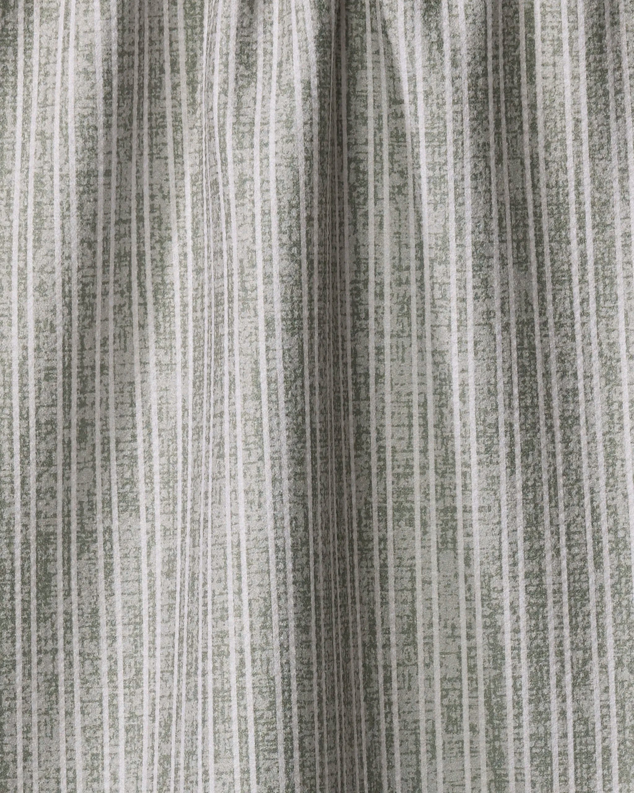 Close-up of the Garff Sage tea towel by Becki Owens, featuring eco-friendly fabric and vertical muted green and white stripes with a hand-drawn look—perfect as a stylish, textured accent for your kitchen.