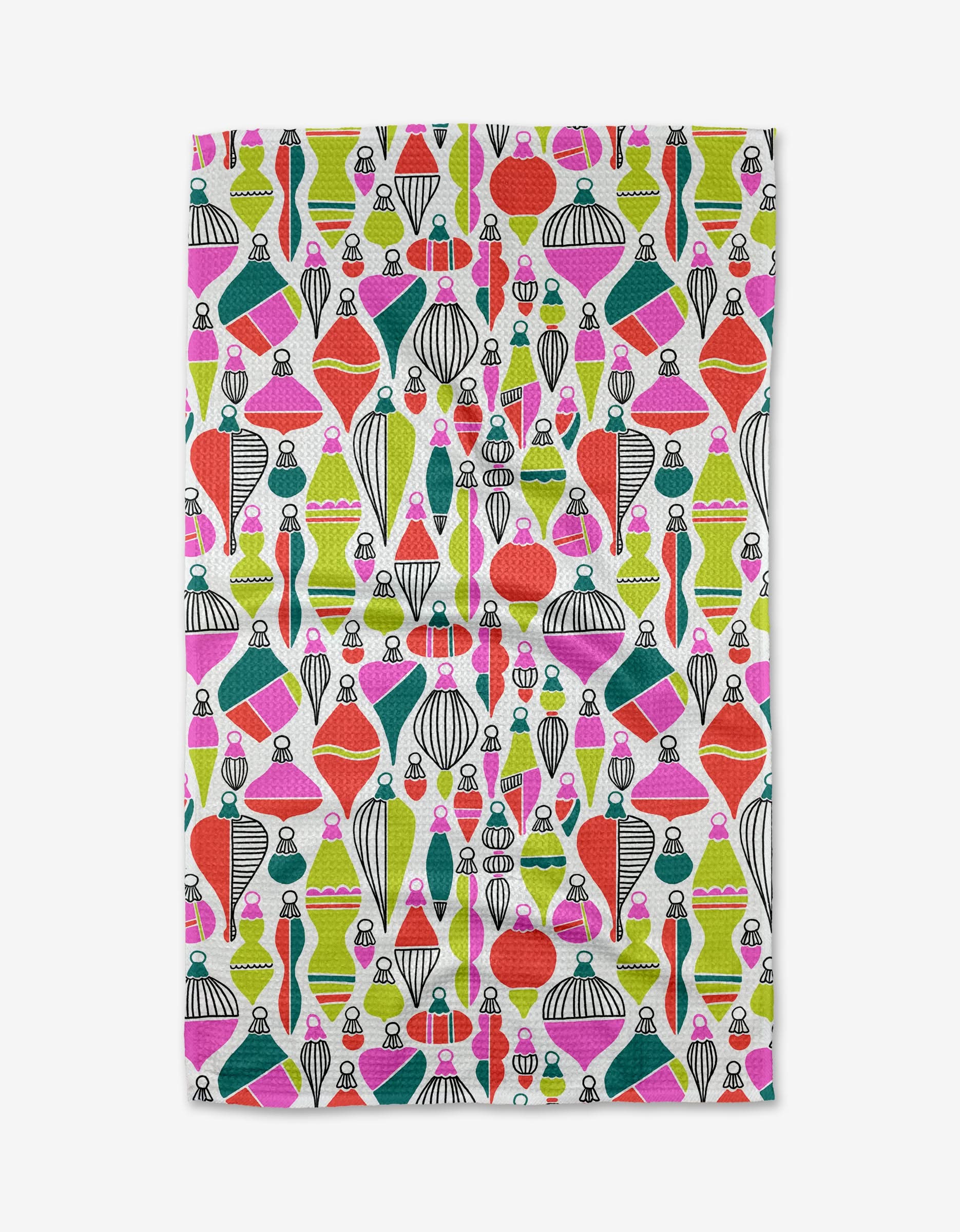 The Gaspar tea towel by Amy MacCready features a festive retro ornament pattern in red, green, pink, lime, and black on white. Made from ultra-absorbent Geoweave fabric, it adds mid-century modern charm to your kitchen.