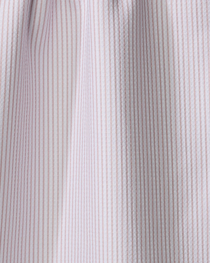 Close-up of The Buy Guide’s Get In Line - Dusty Rose tea towel, featuring thin vertical pink and white stripes on ultra-absorbent, textured fabric, softly draped to show gentle folds and shadows.