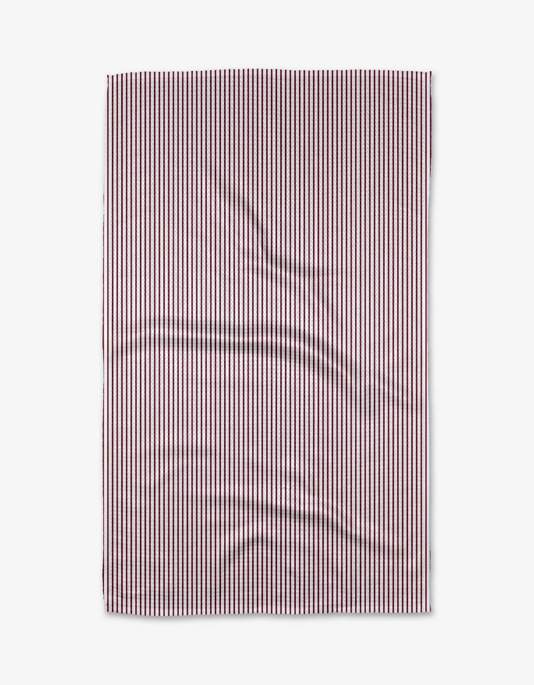 The Buy Guide’s “Get In Line - Wine” Tea Towel features vertical red and blue stripes on white Geoweave™ fabric, displayed slightly wrinkled on a plain light gray background.