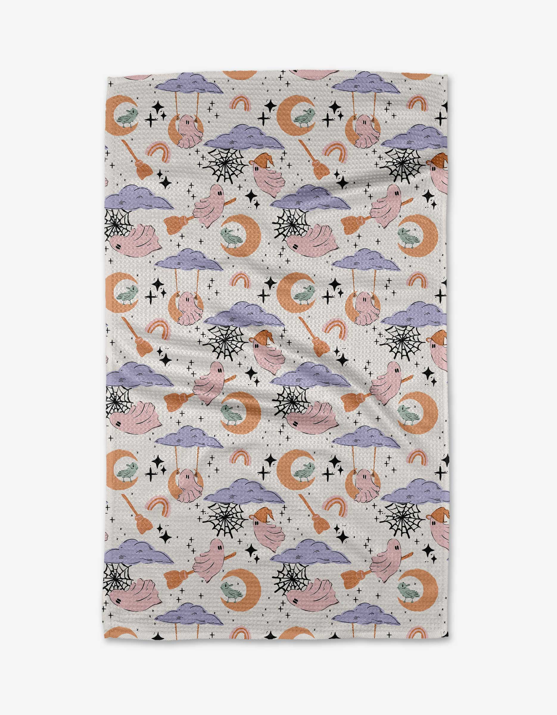 The Ghosts At Play blanket by Charlie Rowan Designs is a quick-drying throw with playful cartoon ghosts, clouds, stars, crescent moons, and rainbows in soft pastels on a light background.