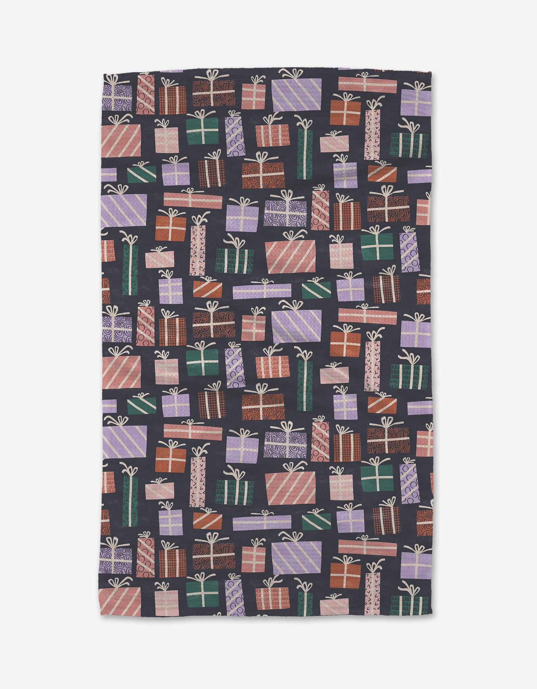 The Gift Stack tea towel by Claire Iglesias features a vibrant pattern of wrapped gift boxes with bows in purple, pink, green, and brown, all set against a dark background.