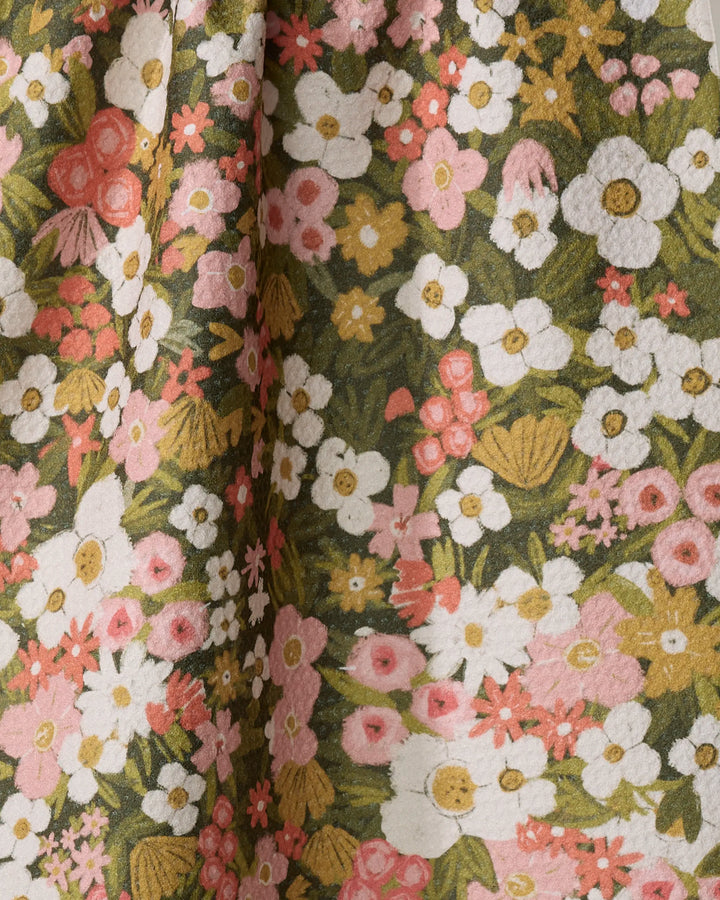 A close-up of the Gilded Garden tea towel by Lisa Nelson, featuring a dense vintage-inspired floral pattern with pink, white, and yellow blooms on quick-drying fabric—perfect for adding color to your kitchen.