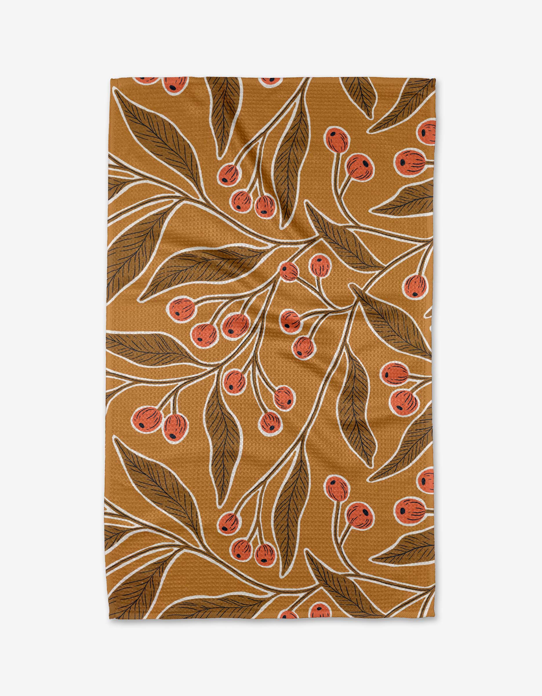 The Golden Berries napkin by Amy MacCready is a brown recycled-fabric napkin with dark green leafy branches, clusters of small red berries, and white outlines.