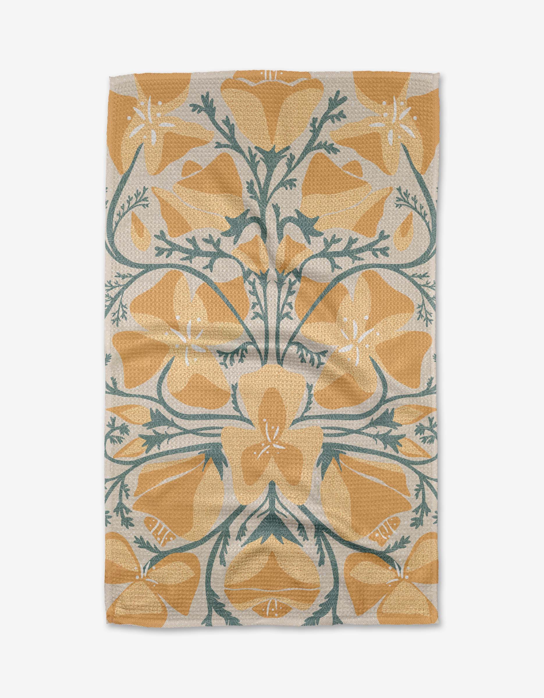 The Julianne Haness Golden Poppy tea towel is beige and yellow with a symmetrical floral pattern of large yellow flowers and green stems, crafted from recycled materials and shown flat with visible creases.