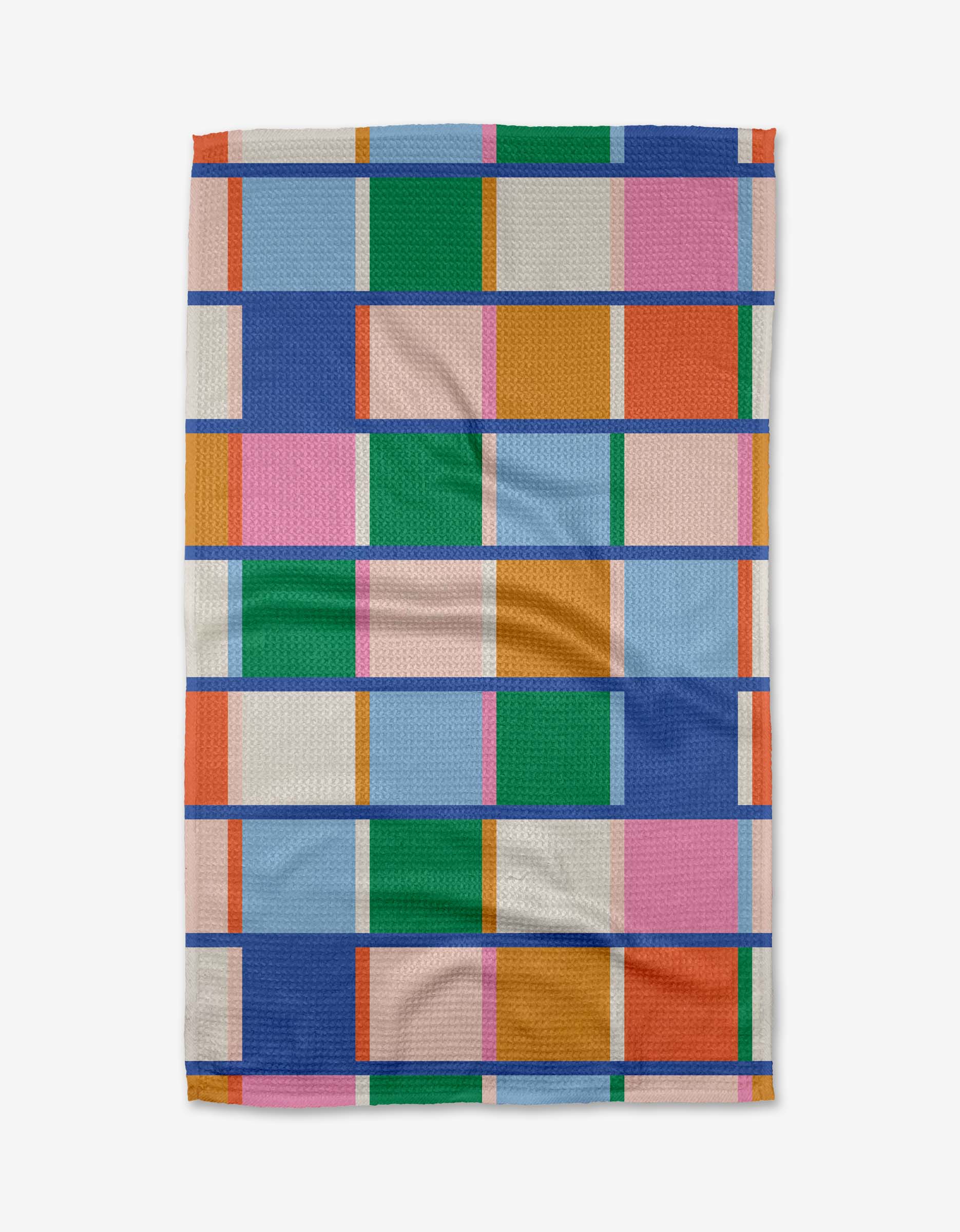 The Grid blanket by Jennifer Bouron features rectangles in blue, pink, orange, green, and white separated by bold blue lines—crafted from recycled materials for an eco-friendly touch.