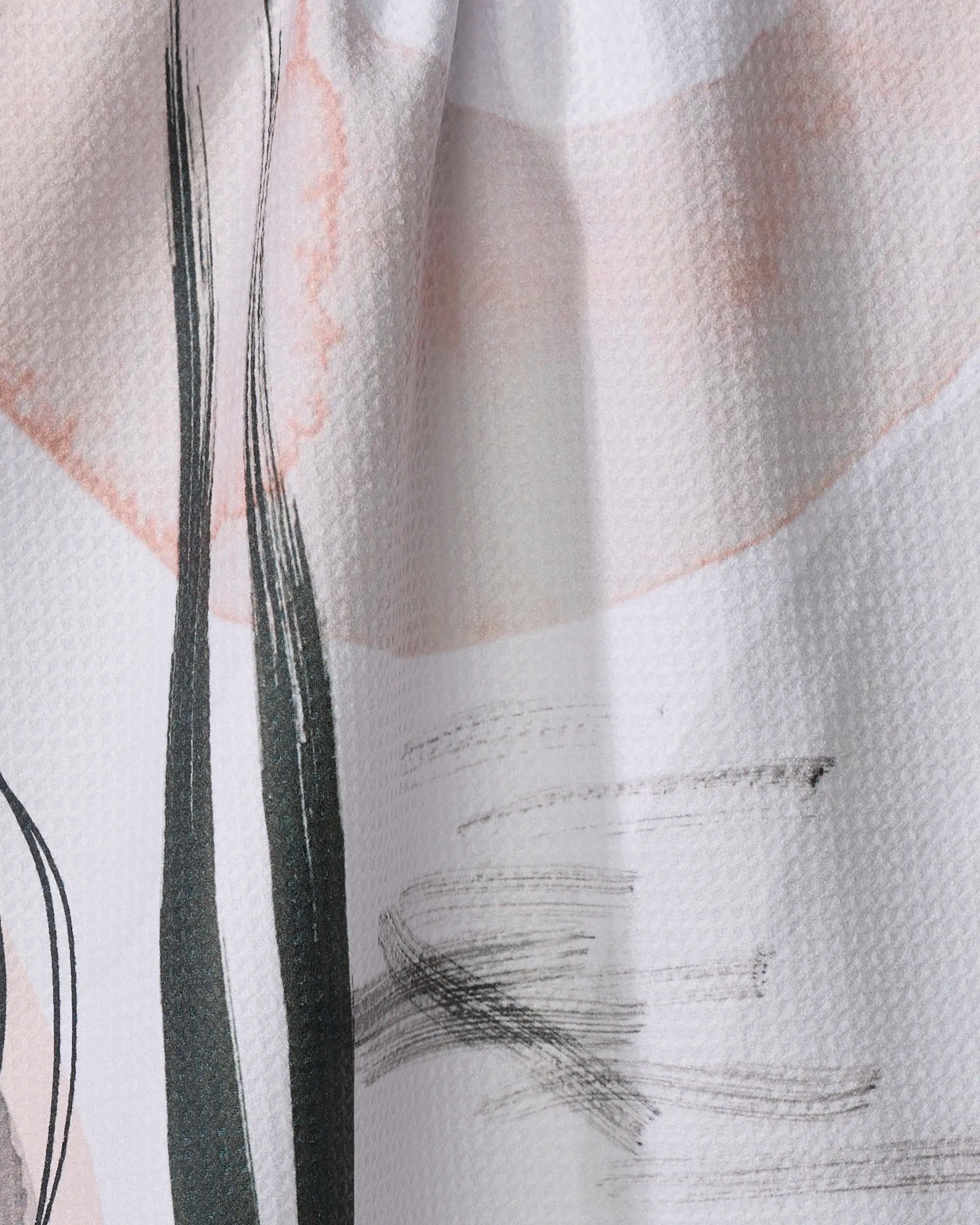 Close-up of Harper Abstract by Kailee Wright, showing textured fabric with soft pink and black brush strokes and curved lines on white—perfect for a stylish recycled kitchen or absorbent tea towel.