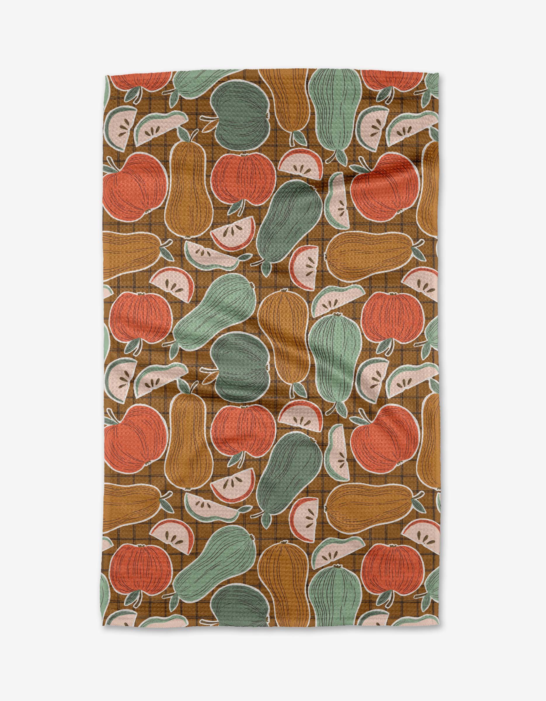 The Heath kitchen towel by Amy MacCready is made from recycled materials and features a vibrant pattern of apples, pears, and citrus slices in red, green, yellow, and orange on a brown background.