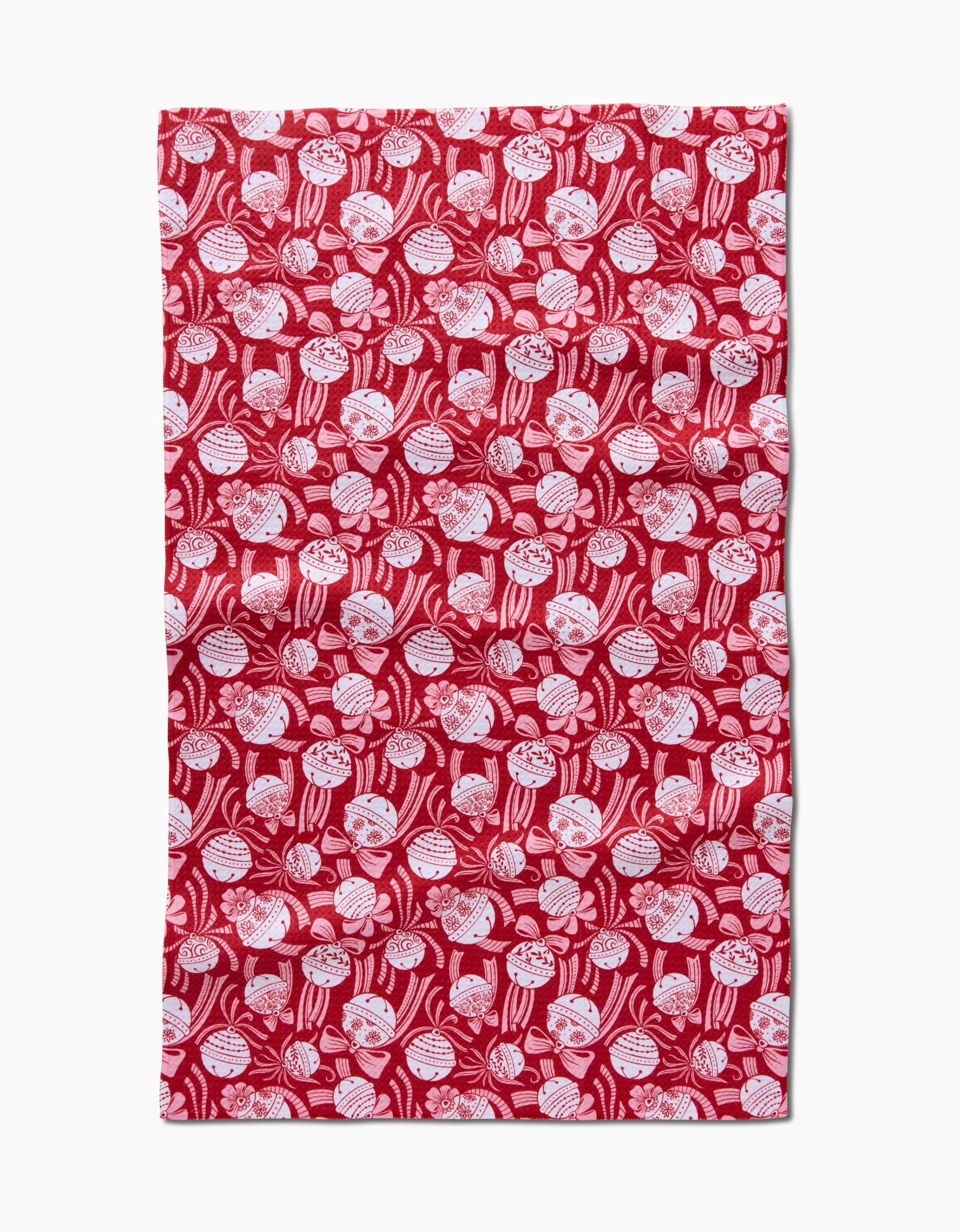 The Holiday Bells Bows tea towel by Sarah Daugherty is a rectangular red dish towel featuring a dense, all-over pattern of white lollipops with bows—an absorbent, whimsical accent for your kitchen décor.
