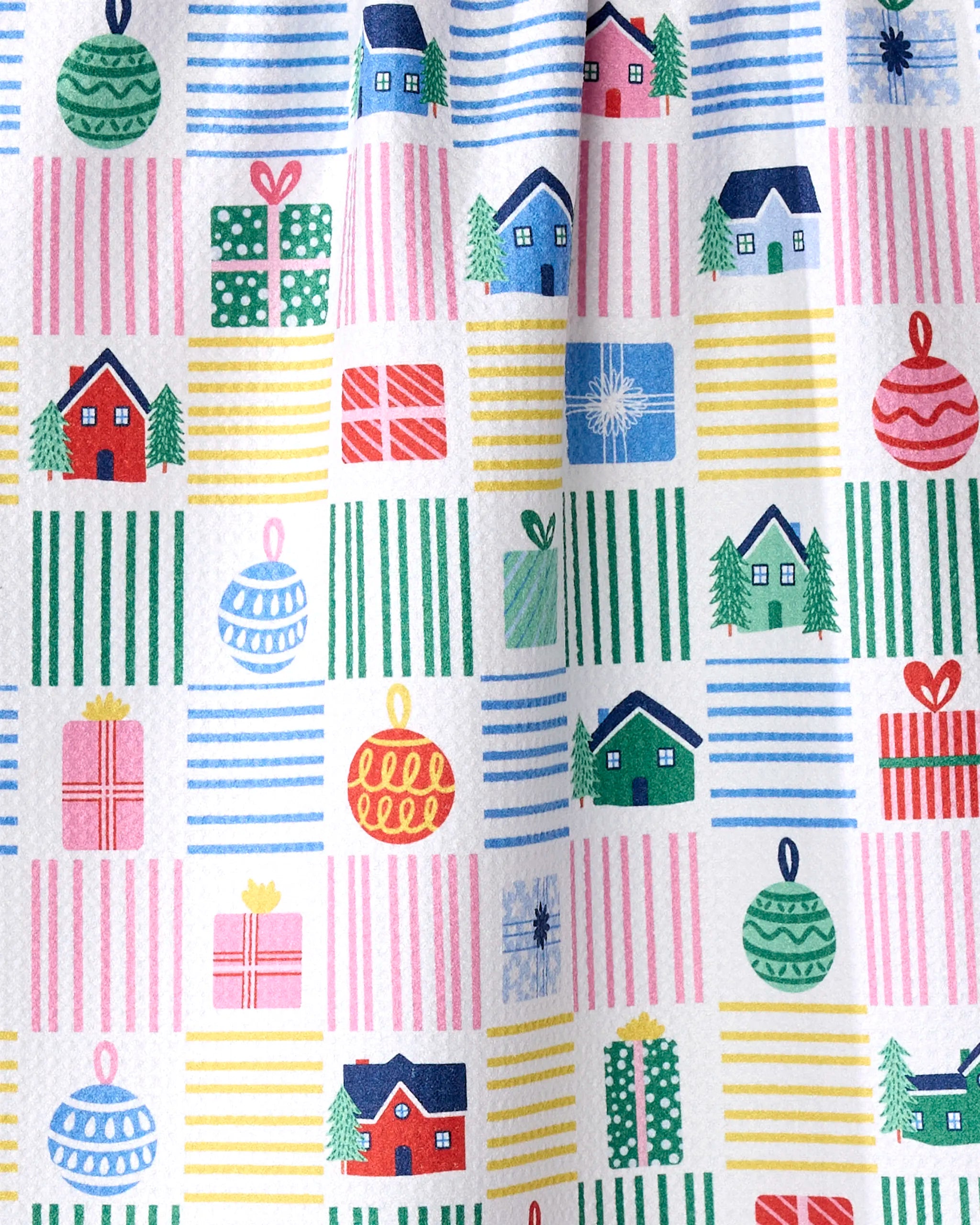 Holiday Checkered by Ceyda Alasar: festive recycled wrapping paper with houses, Christmas trees, ornaments, gifts, and bold stripes in blue, red, green, yellow, and pink—perfect for celebrating the holidays.