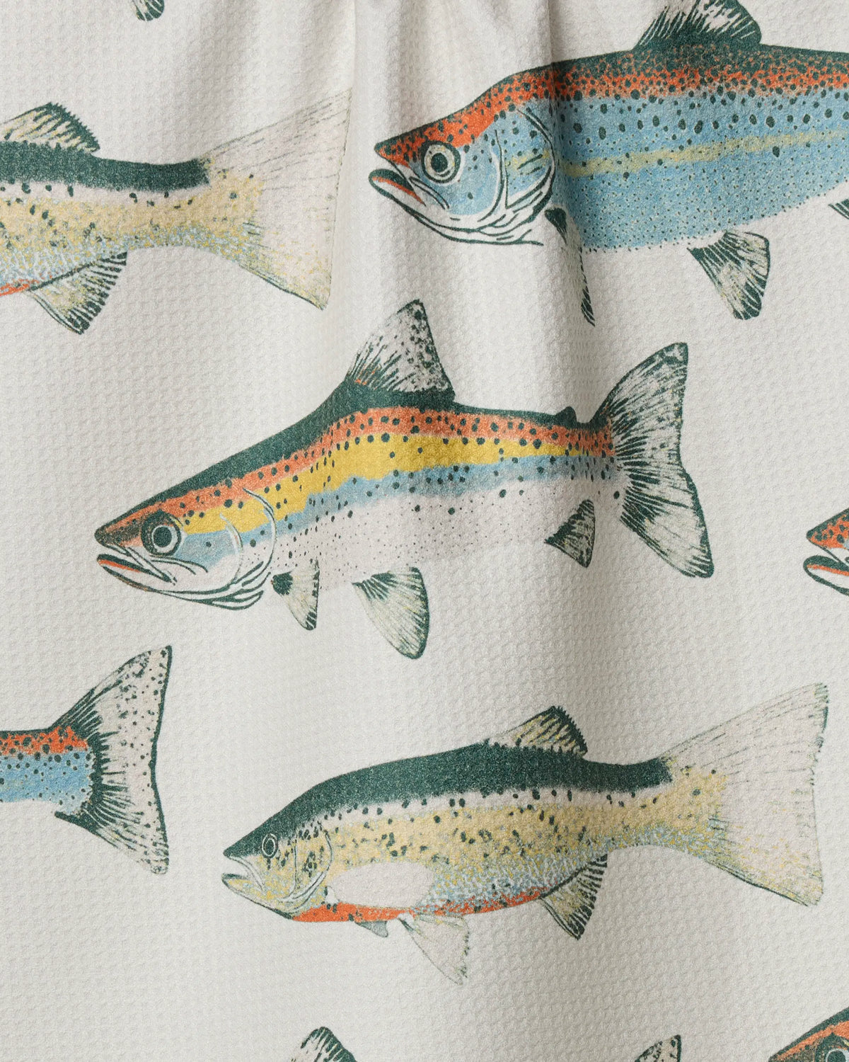 The Geometry "Hooked on Fishing" kitchen towel features a vibrant trout pattern in green, orange, and yellow on a textured white background, blending eco-friendly absorbency with colorful charm for any space.