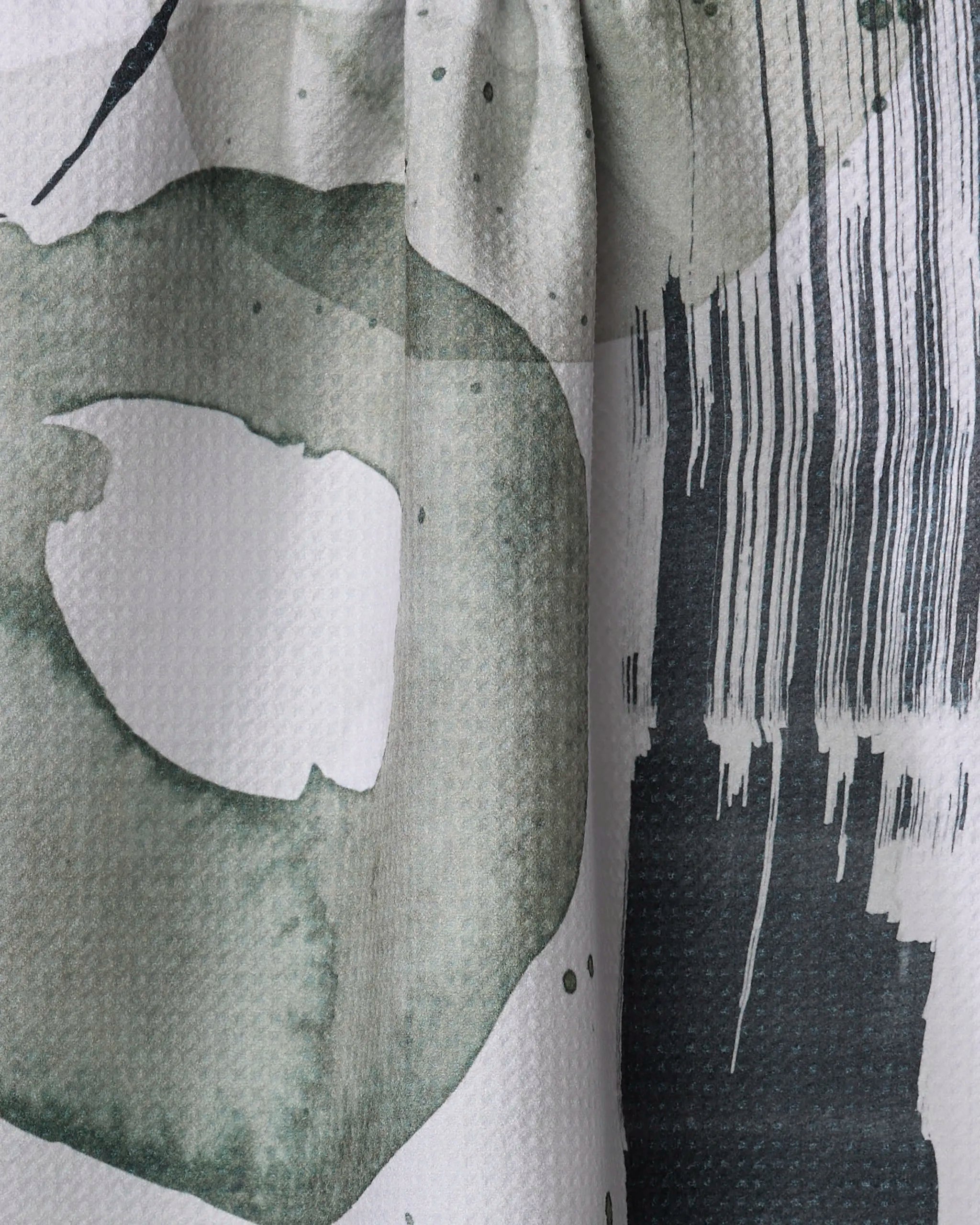 Hunter Abstract by Kailee Wright features an abstract watercolor design with irregular greenish circles and dark vertical lines on textured white, ideal for a chic tea towel crafted from recycled materials.