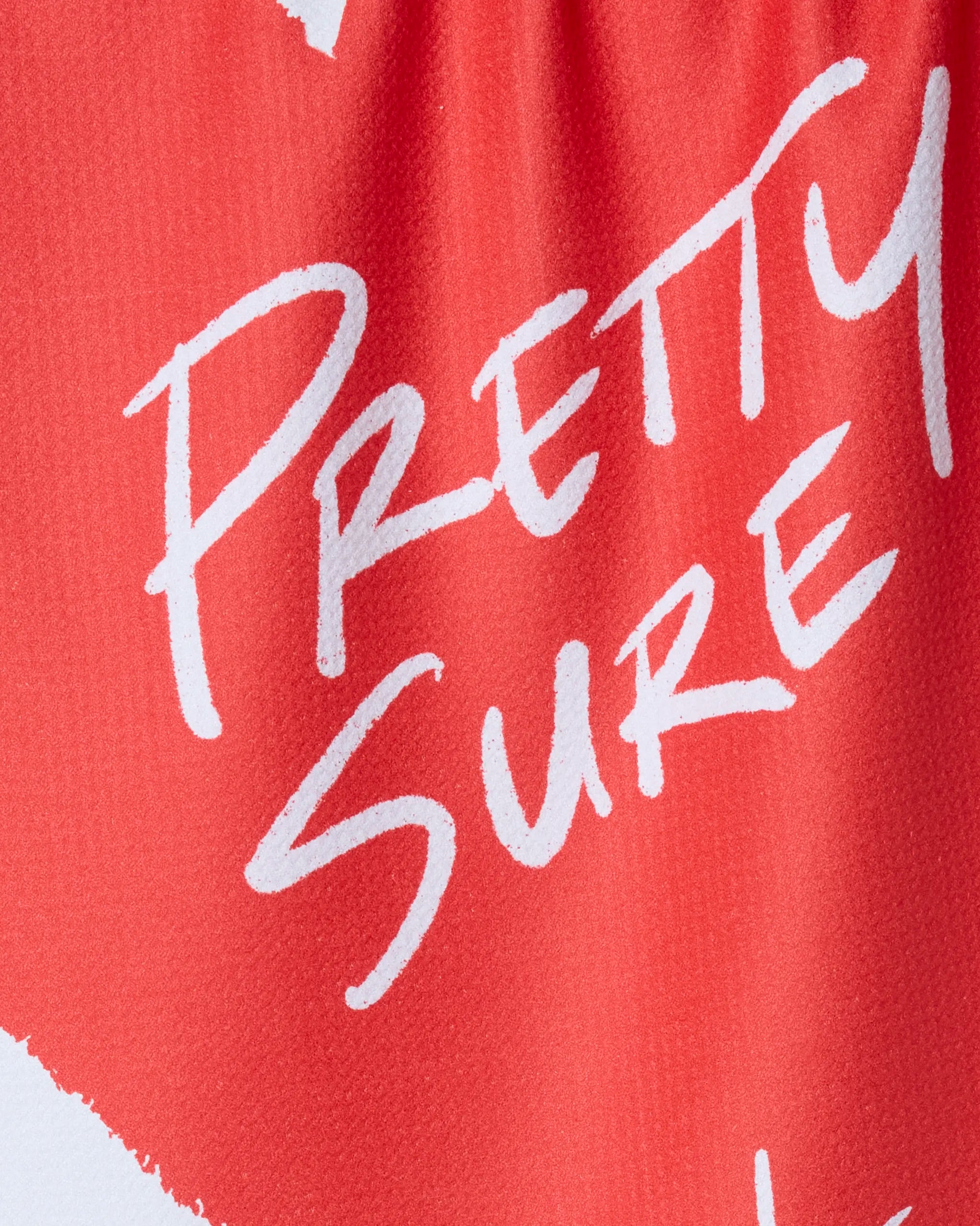 A close-up of red fabric from Geometry, featuring the handwritten white text "I Love Thee" printed on it.