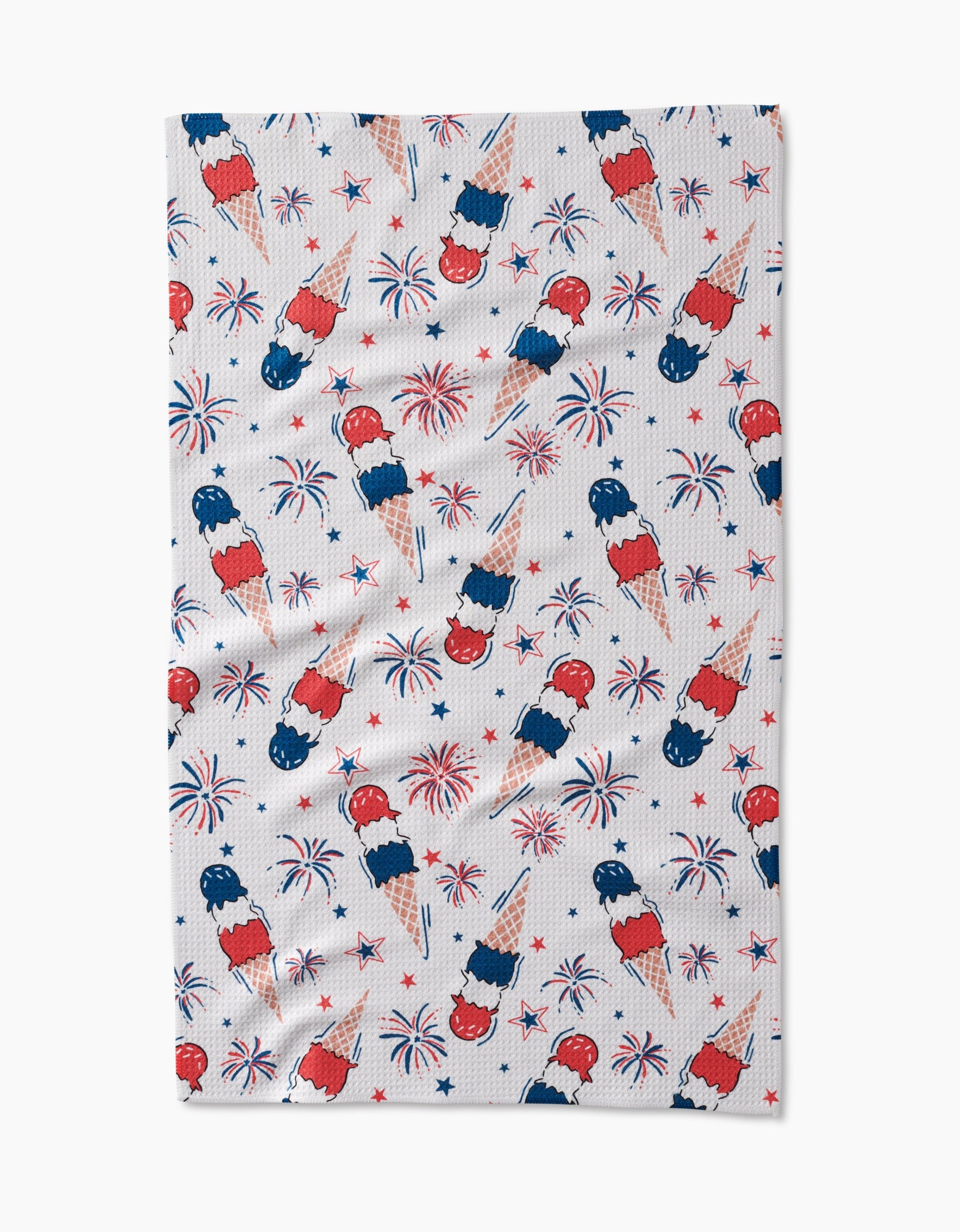 Add a festive touch with the Hufton Studio Ice Cream Celebration Tea Towel, featuring a white textured design with red, white, and blue ice cream cones, fireworks, and stars—ultra-absorbent and made from recycled materials.