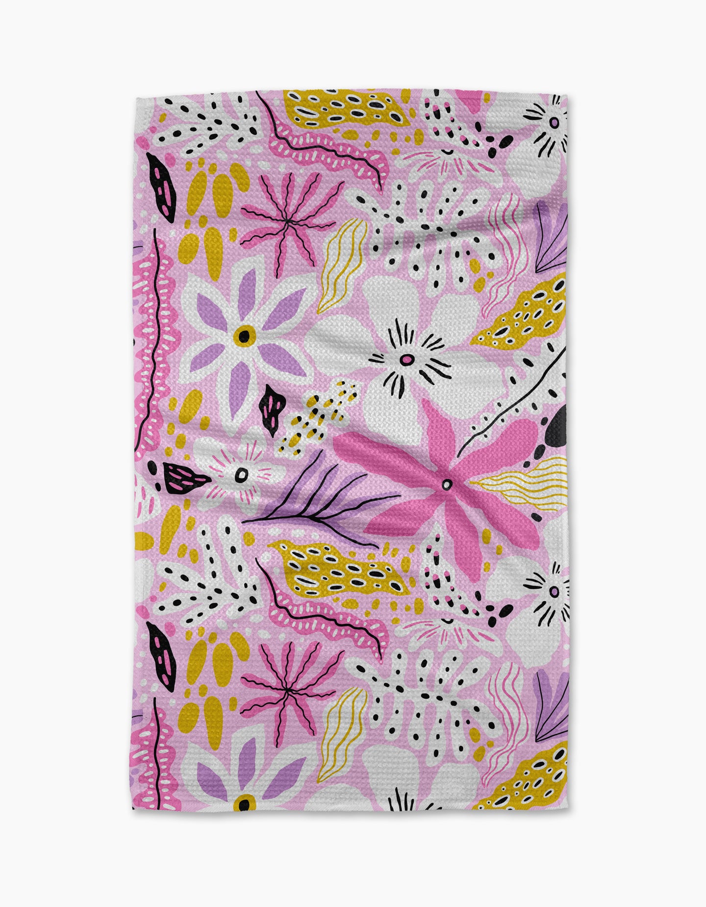 Island Time by Marina Solodka is a rectangular white tea towel with a lively abstract floral pattern, featuring pink, purple, yellow, and black shapes in a whimsical design.