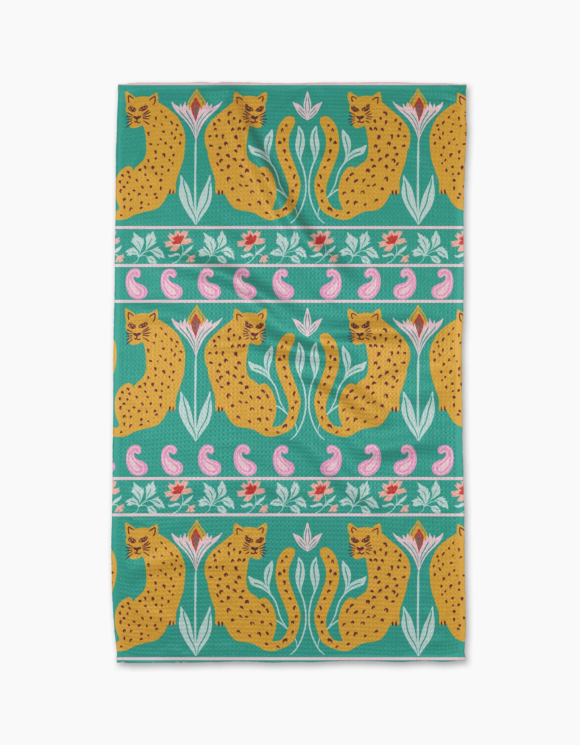 The Jungle Blooms tea towel by Jasmine Blooms Designs features yellow cheetahs, pink flowers, and green leaves in a repeating pattern on a teal background with horizontal stripes.