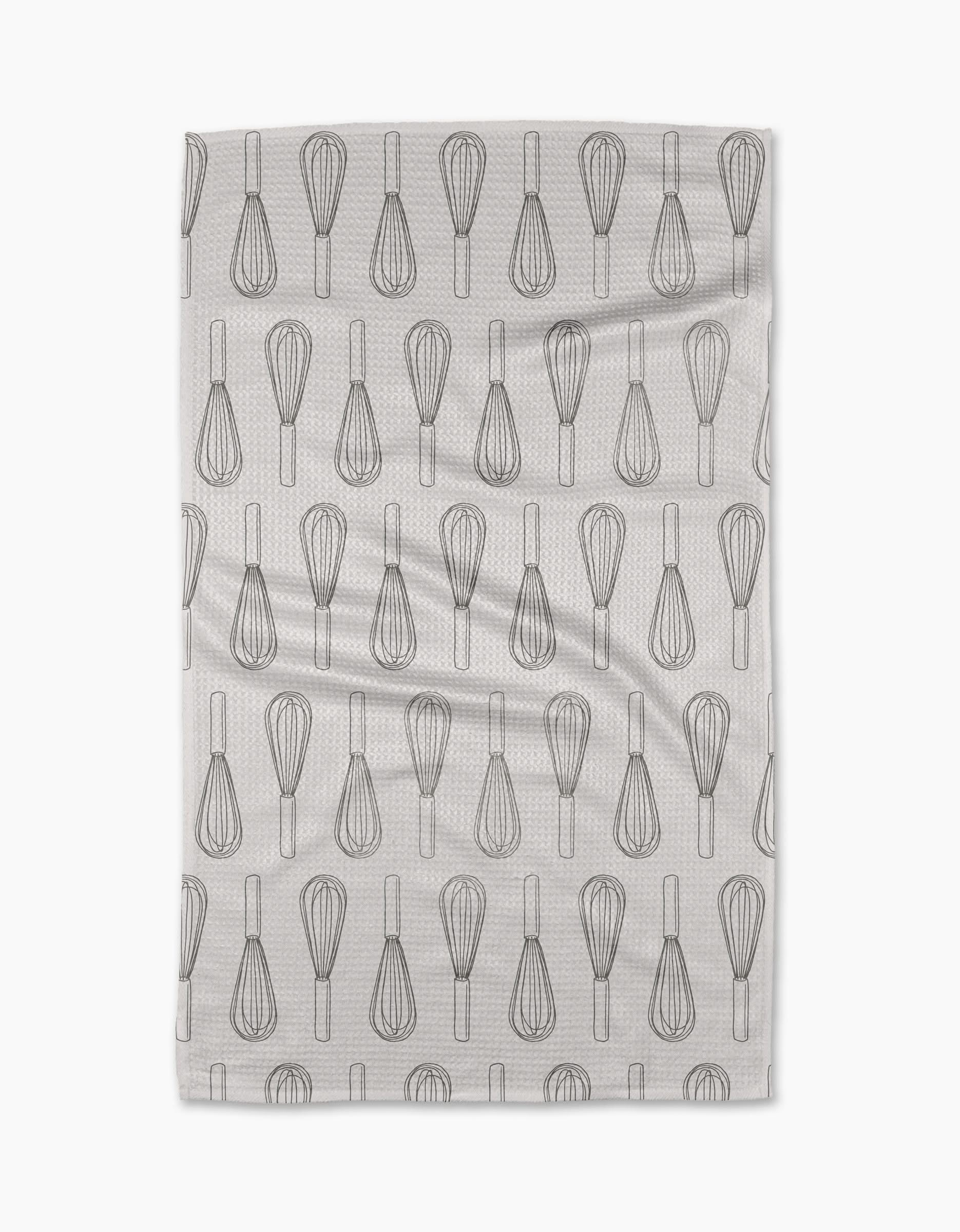 The Rosa Kichline Kitchen Whisks tea towel features a repeating pattern of black whisk line drawings on white, arranged in neat rows. Made from recycled materials, it has a subtle texture and is displayed on a plain white background.