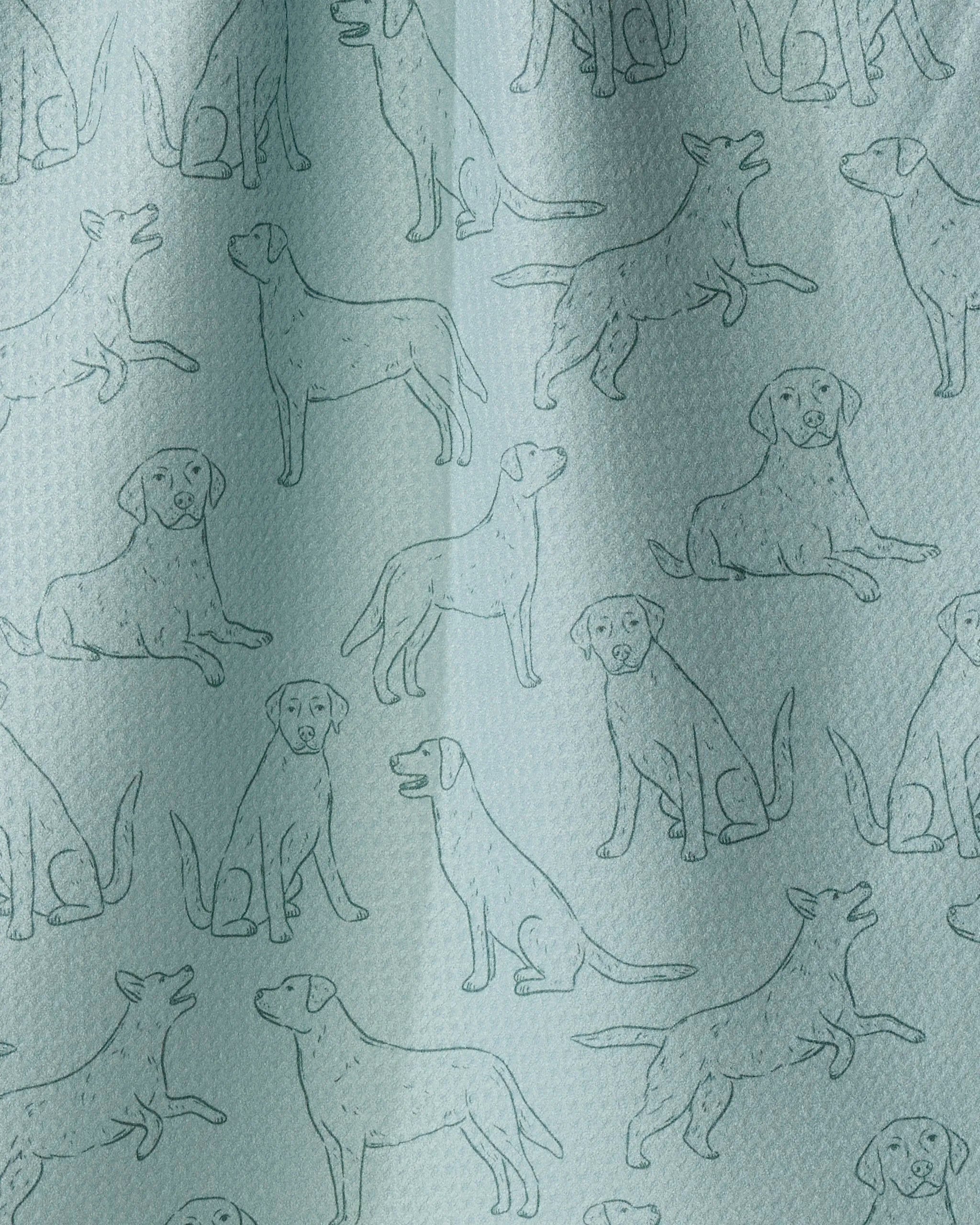 Introducing the Lab Pups tea towel by Geometry: an eco-friendly, ultra-absorbent towel made from recycled materials. This light blue fabric is adorned with a playful, repeating pattern of sketched Labrador puppies in various poses—sitting, standing, and lying down—with simple outlines rendered in a deep blue-green shade for added charm.