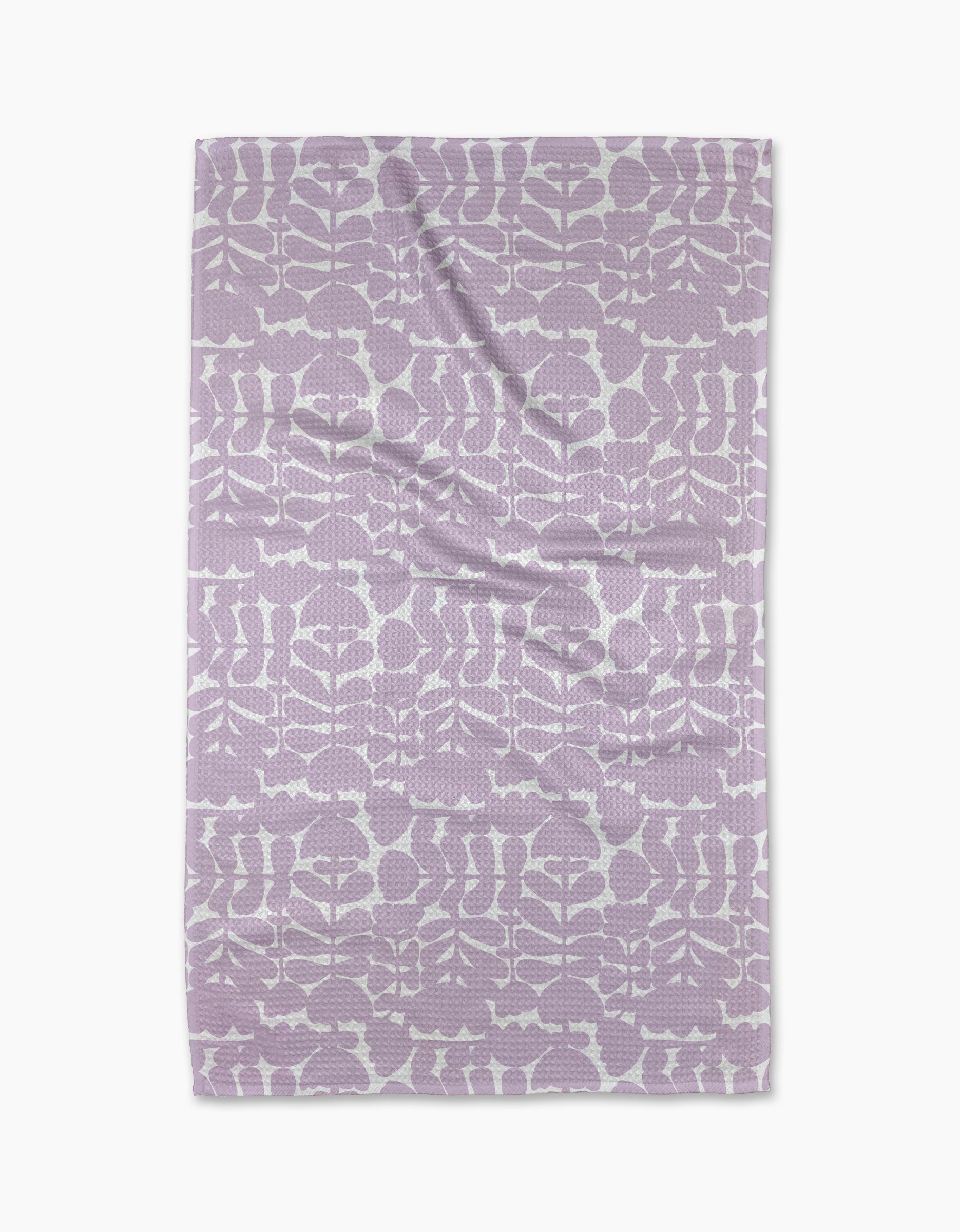The Lavender Scandi Flowers blanket by Katie OShea, made from recycled materials, showcases a lavender and white floral pattern arranged in rows, displayed flat against a white background.
