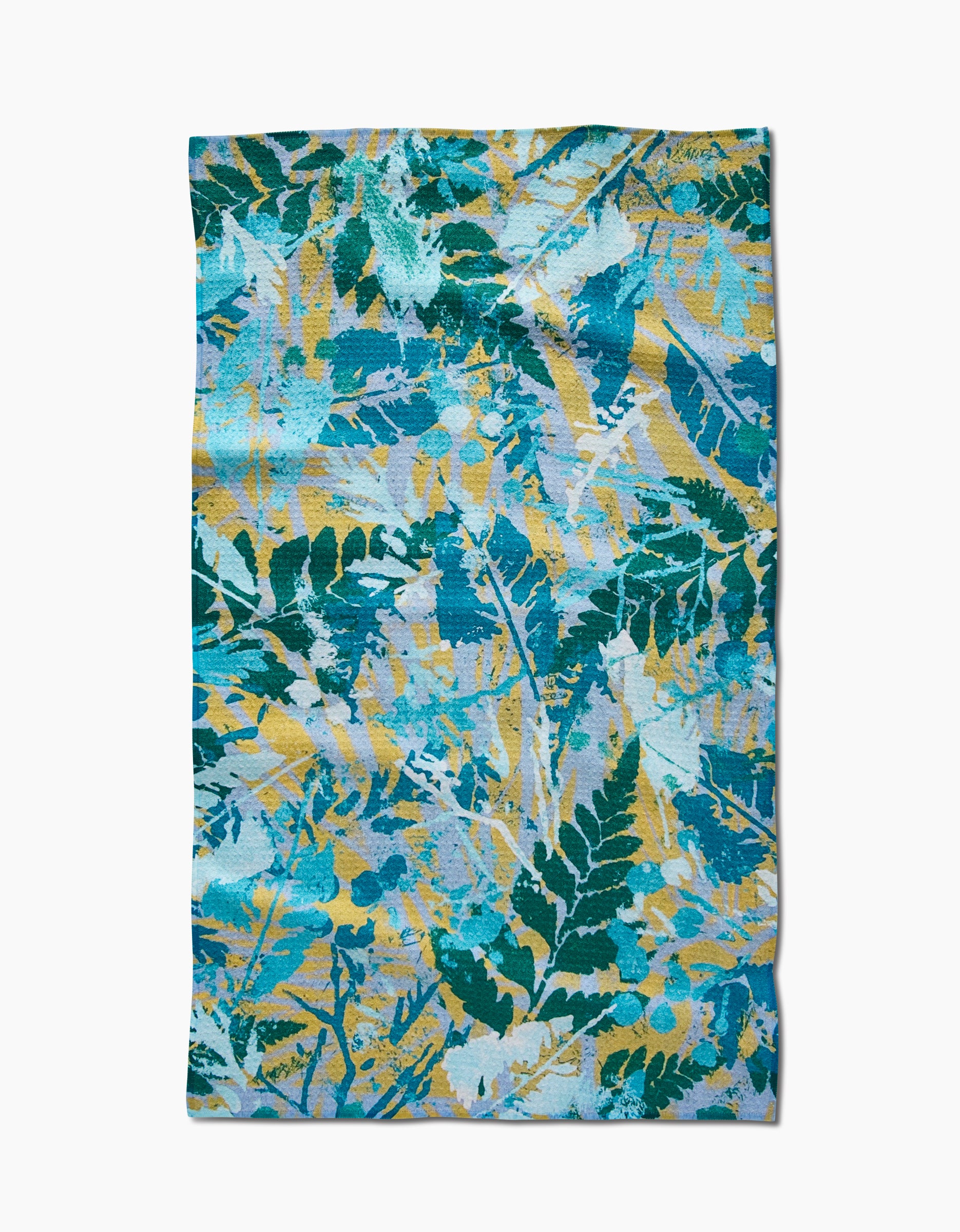 The Leafy Bush tea towel by Taryn Brennan features a vibrant blue, green, and yellow botanical pattern on premium Geoweave fabric for excellent absorbency.