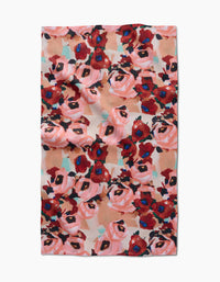 The Lucia Tea Towel by Ania Zwara Art features a vibrant abstract floral design in red, pink, and blue on a light background, crafted with Geoweave™ fabric for excellent absorbency and durability.