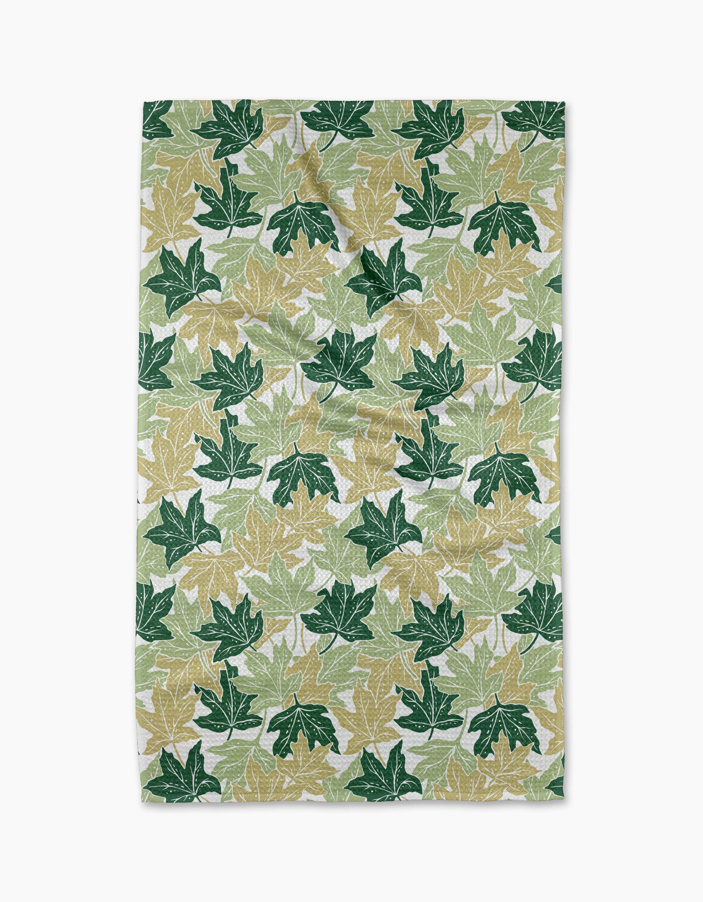 The Maple Leaves tea towel by Sarah Daugherty features a repeating pattern of green and yellow maple leaves on white, creating a botanical, nature-inspired look for your kitchen.