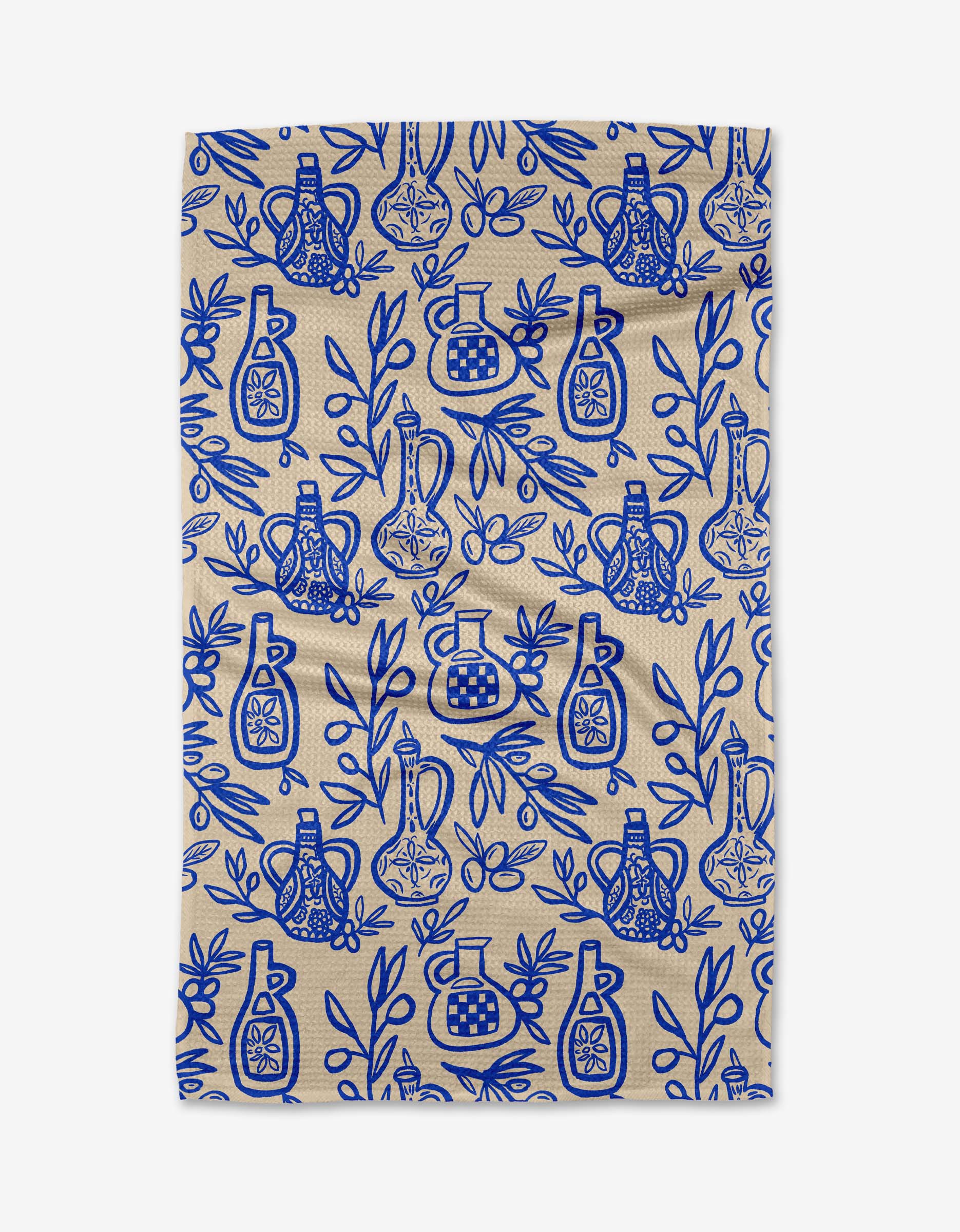 Lisa Nelson’s “Mediterranean Pour” is a beige recycled kitchen towel with a blue pattern of bottles, lemons, and leafy branches in a repeating design.